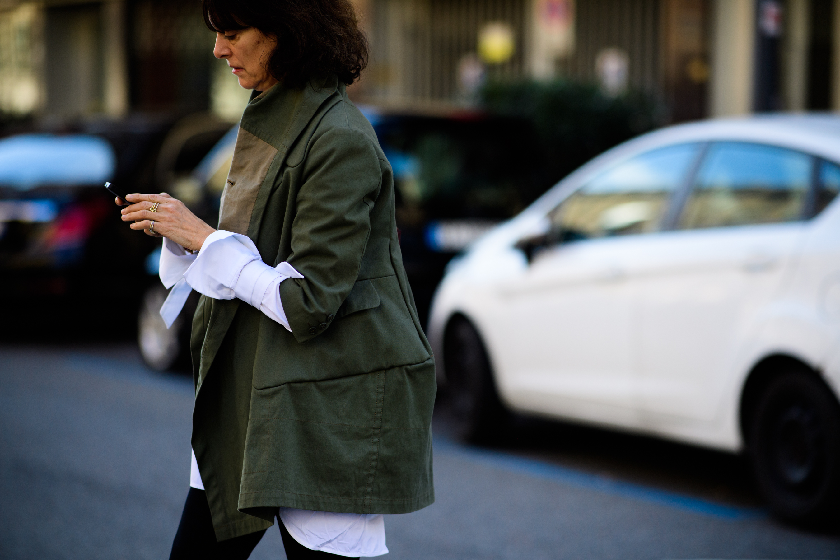 Woman wearing navy jacket