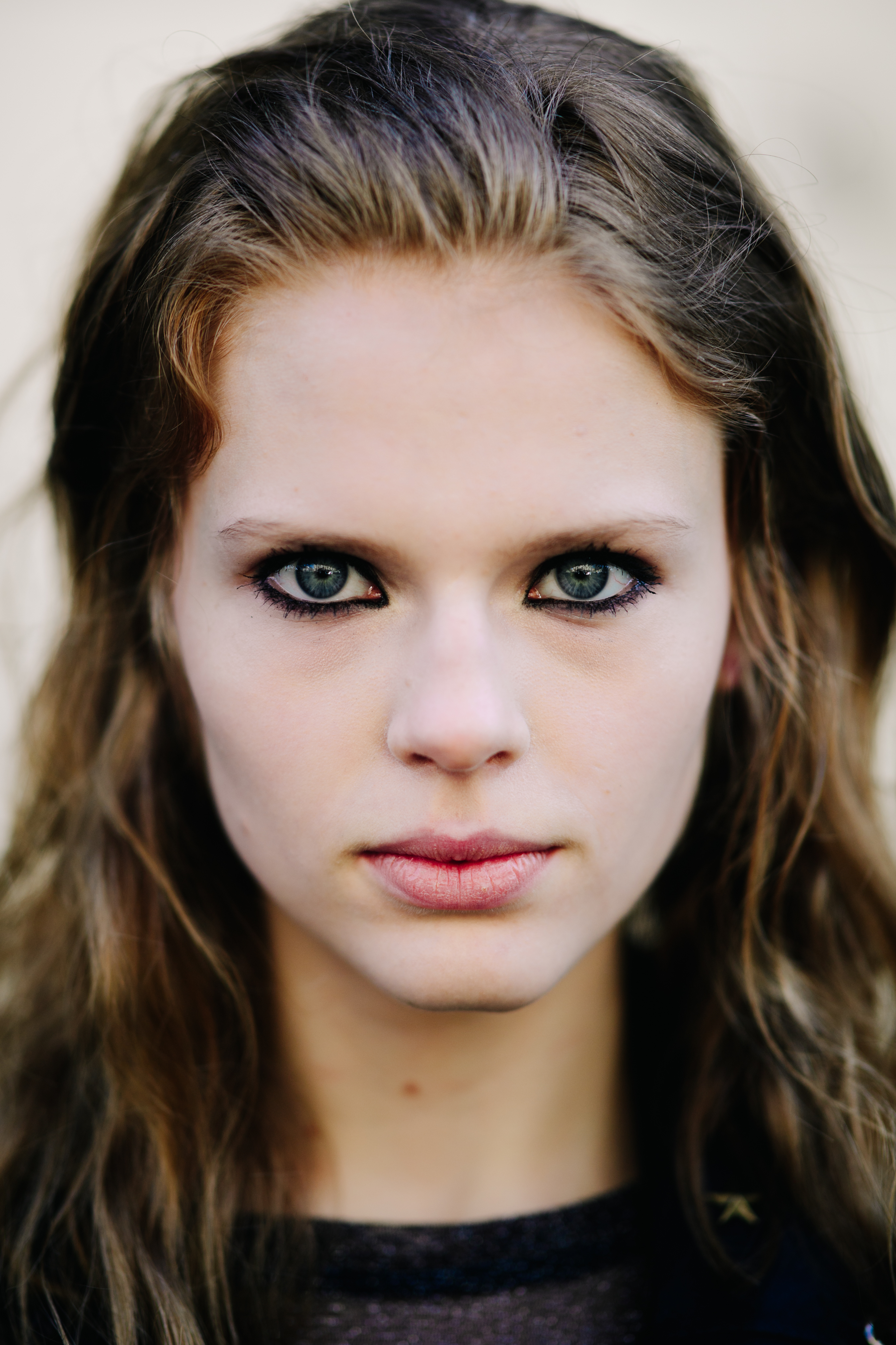 Portrait of model with makeup after the show