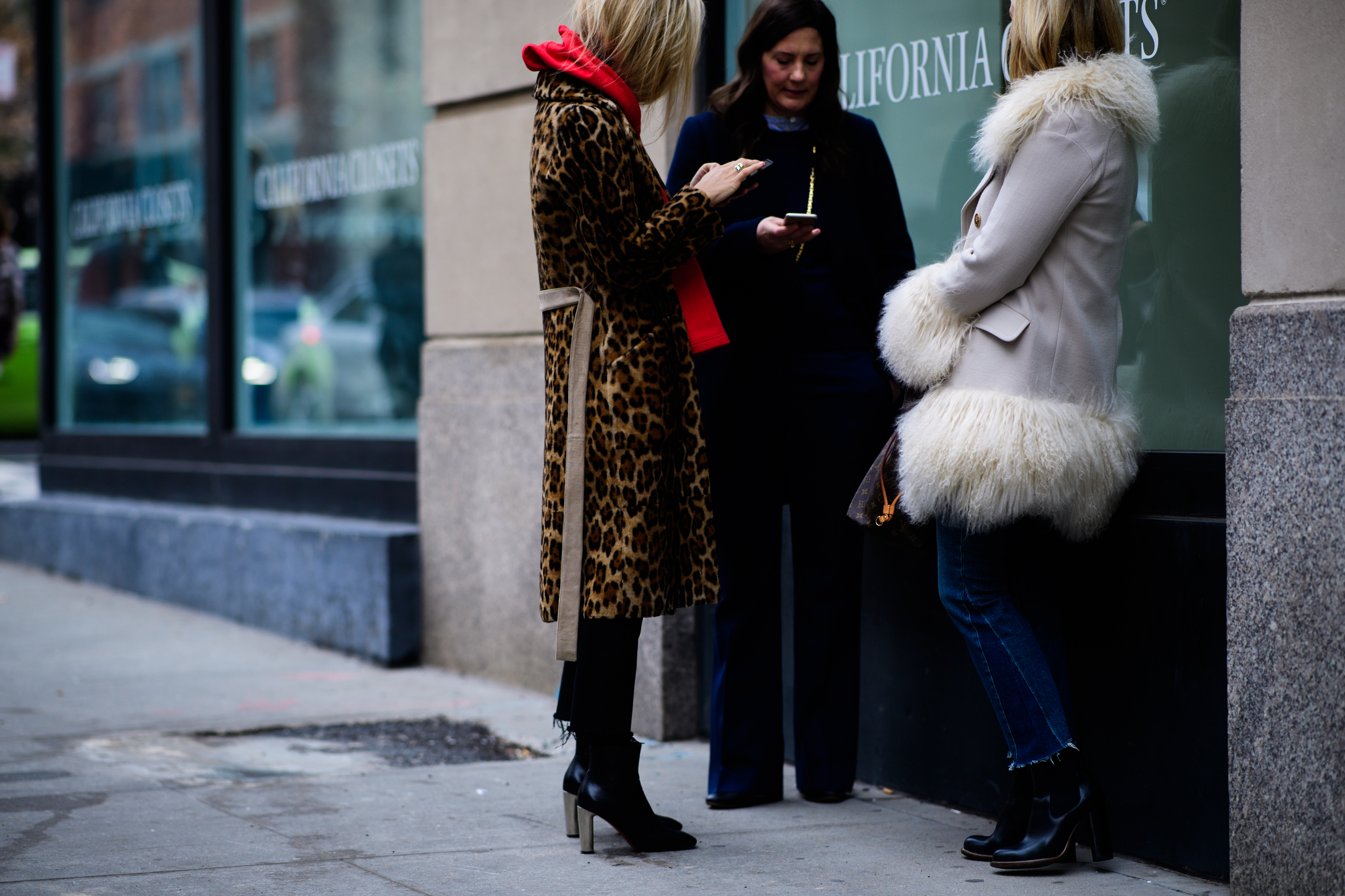 Woman wearing Louis Vuitton bag