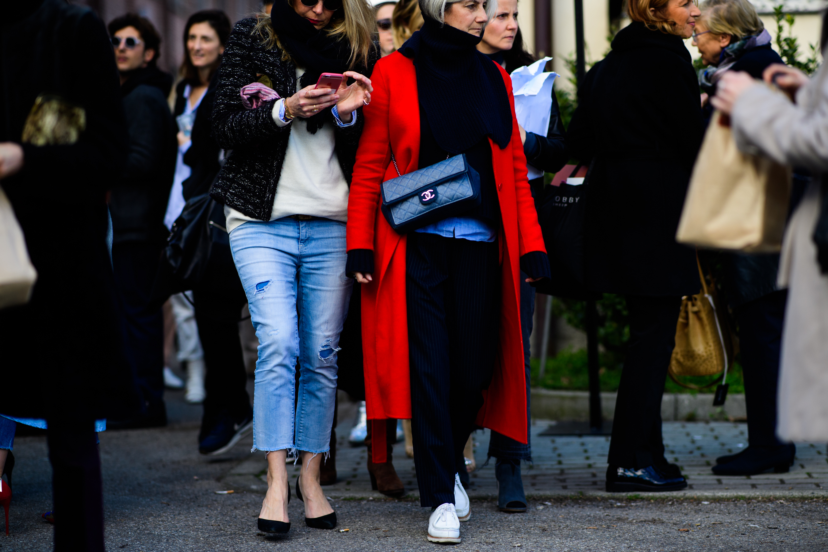 Woman wearing Chanel bag