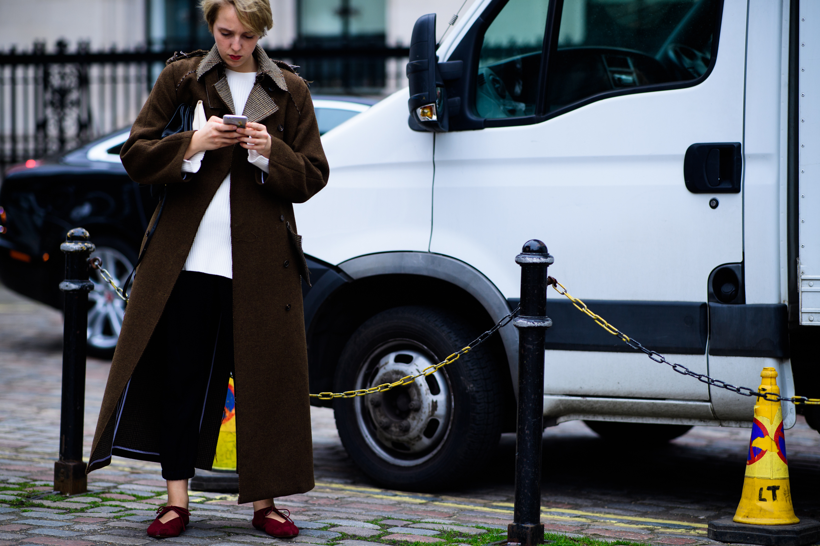 Woman wearing brown coat