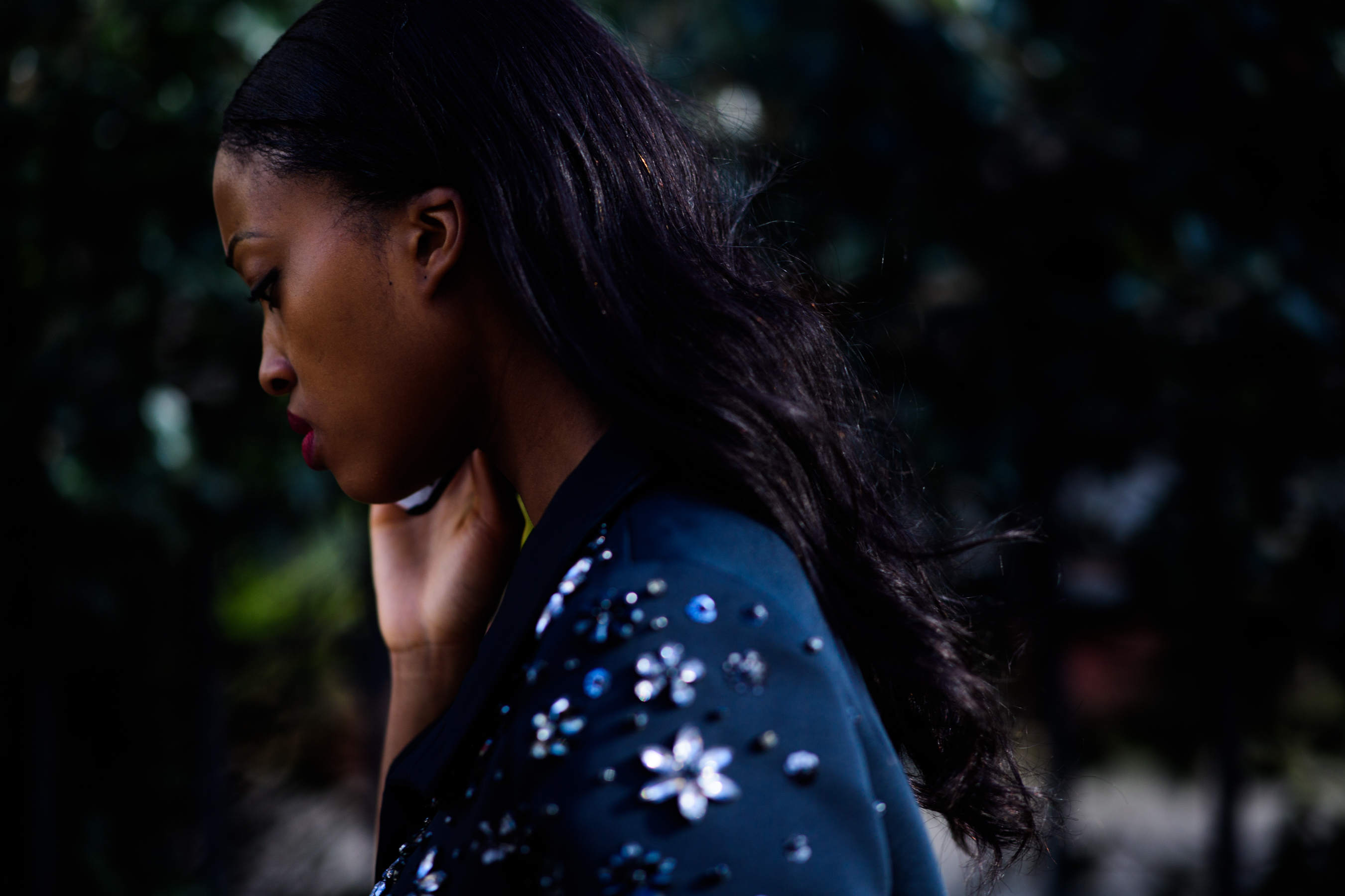 Model wearing bomber with crystals