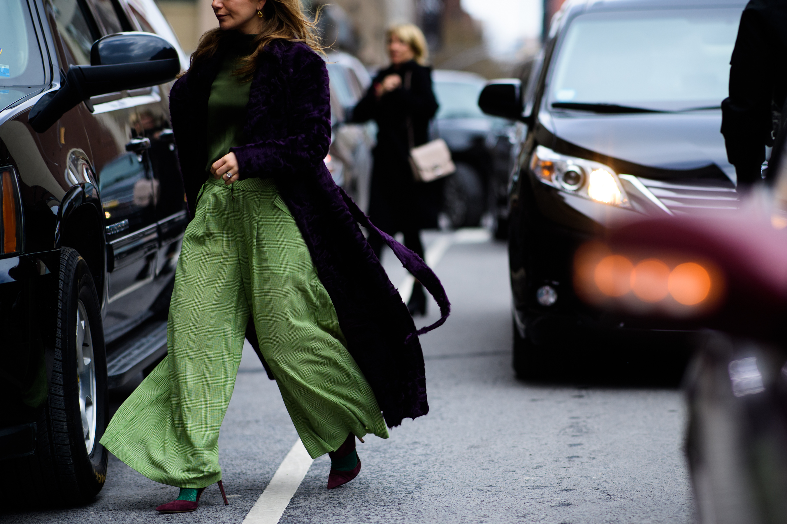 Woman wearing light green suit