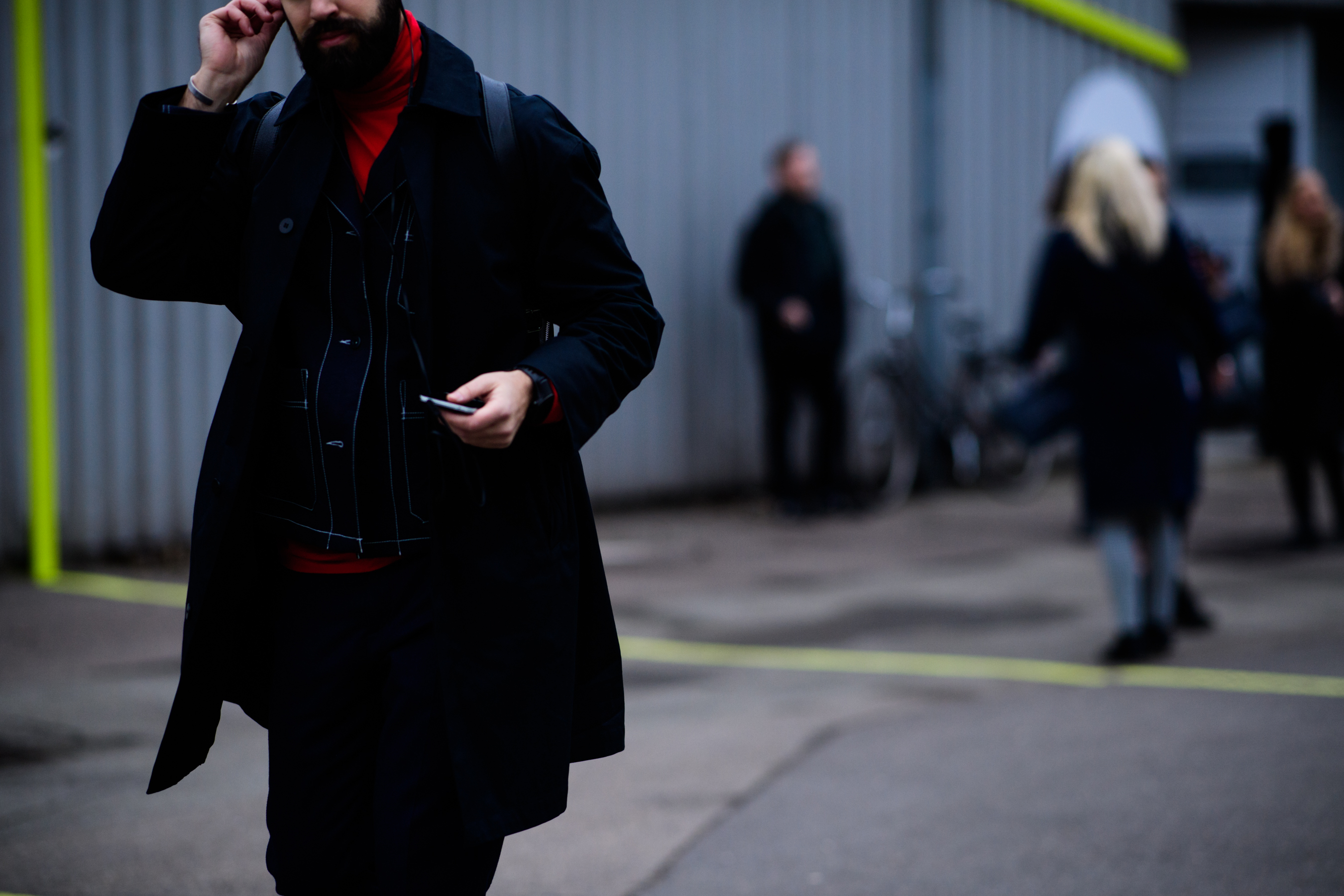 Man wearing black coat
