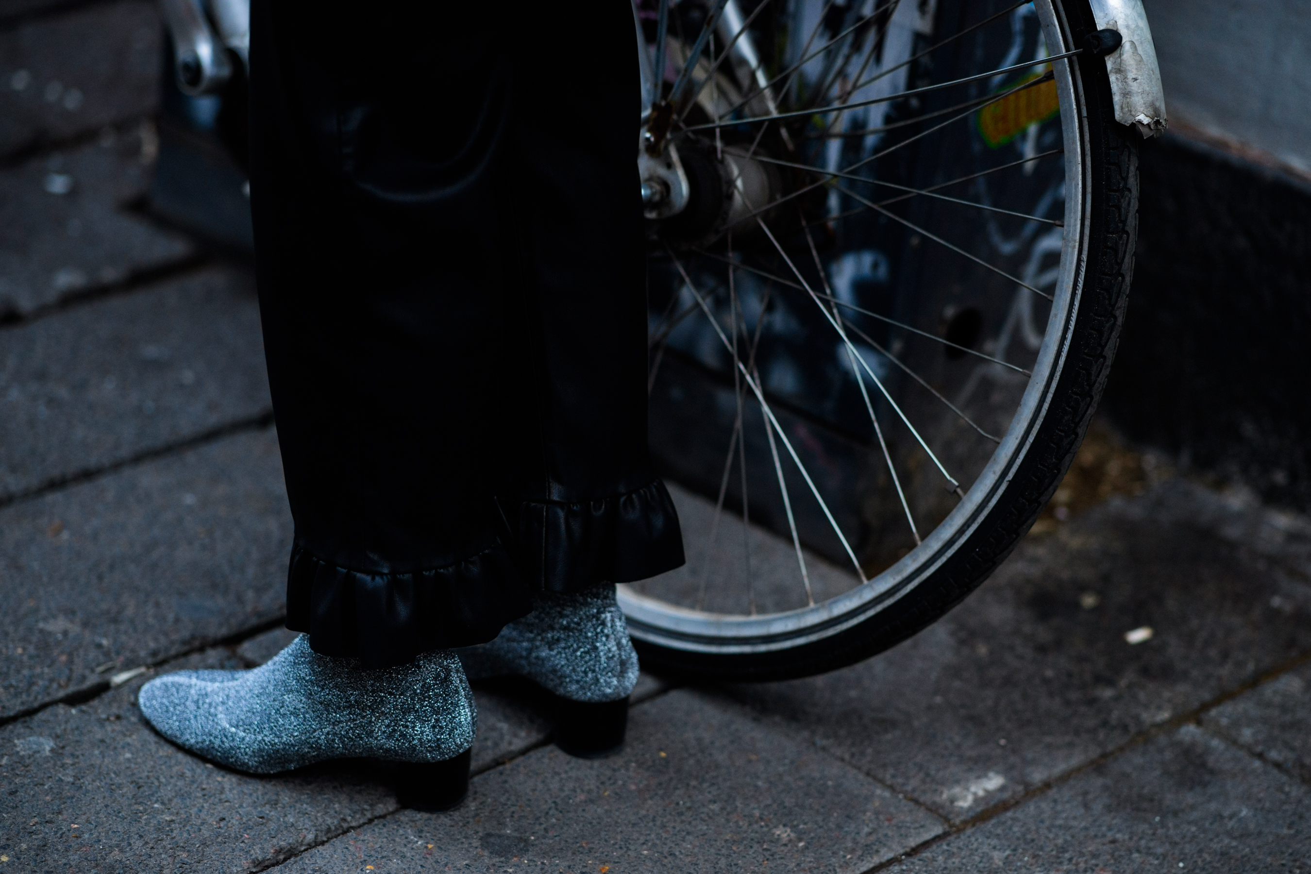 Woman wearing glitter shoes