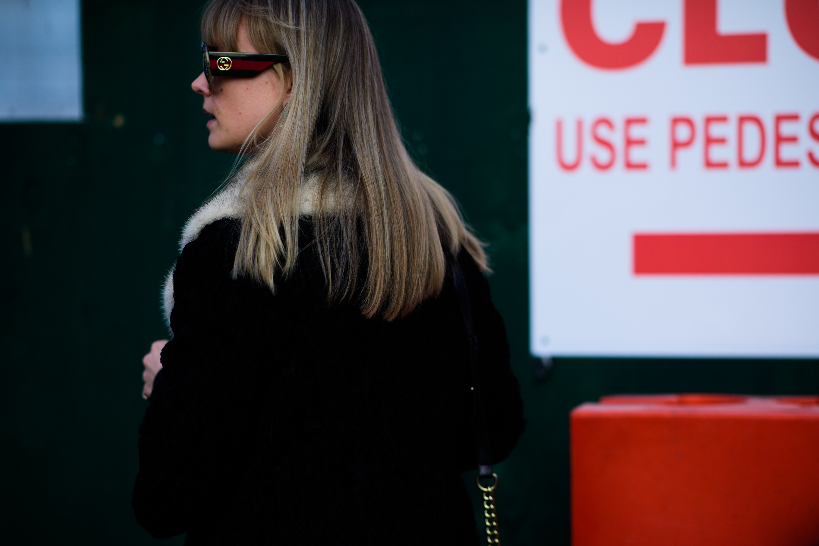 Woman wearing Gucci sunglasses