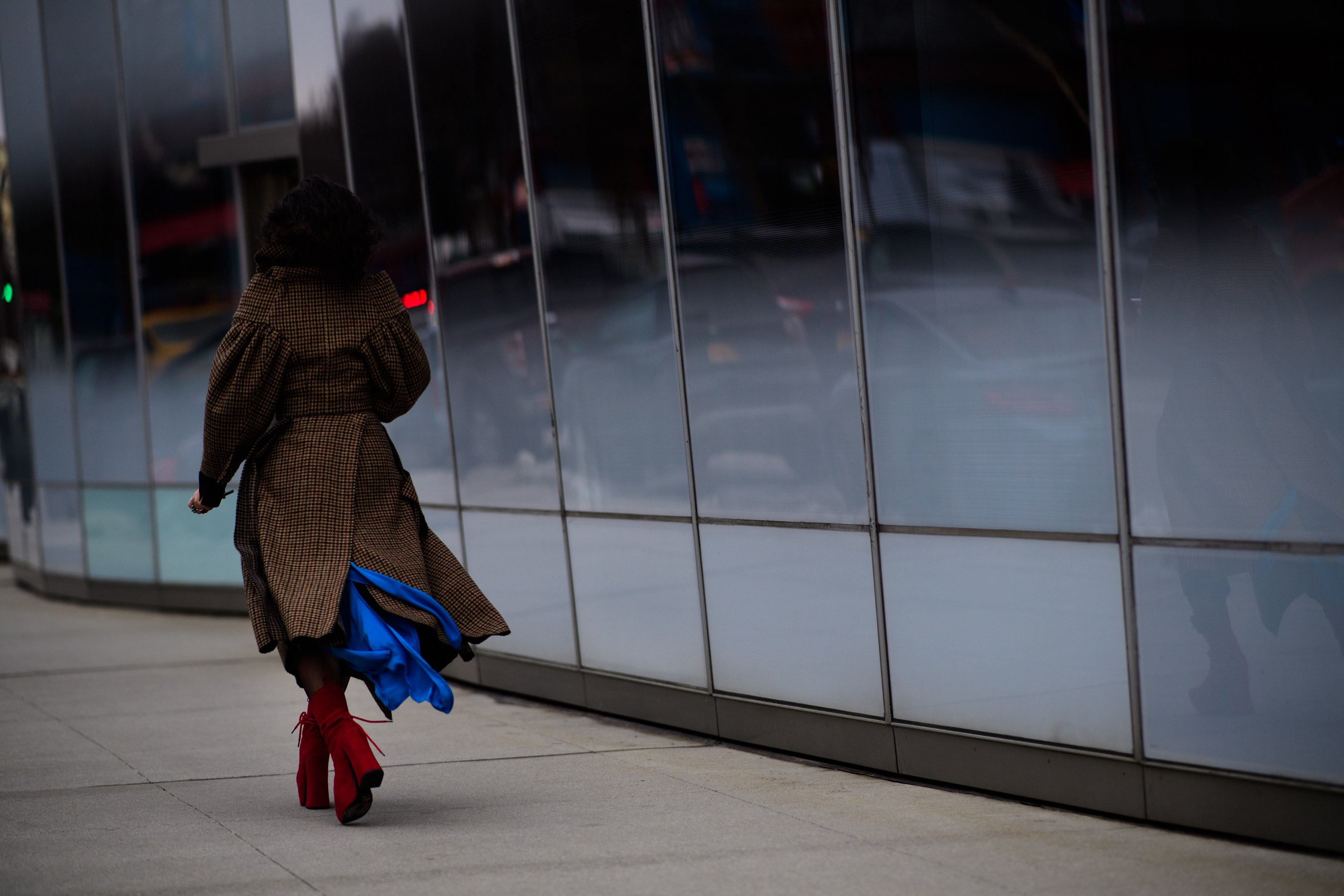 Woman wearing brown coat