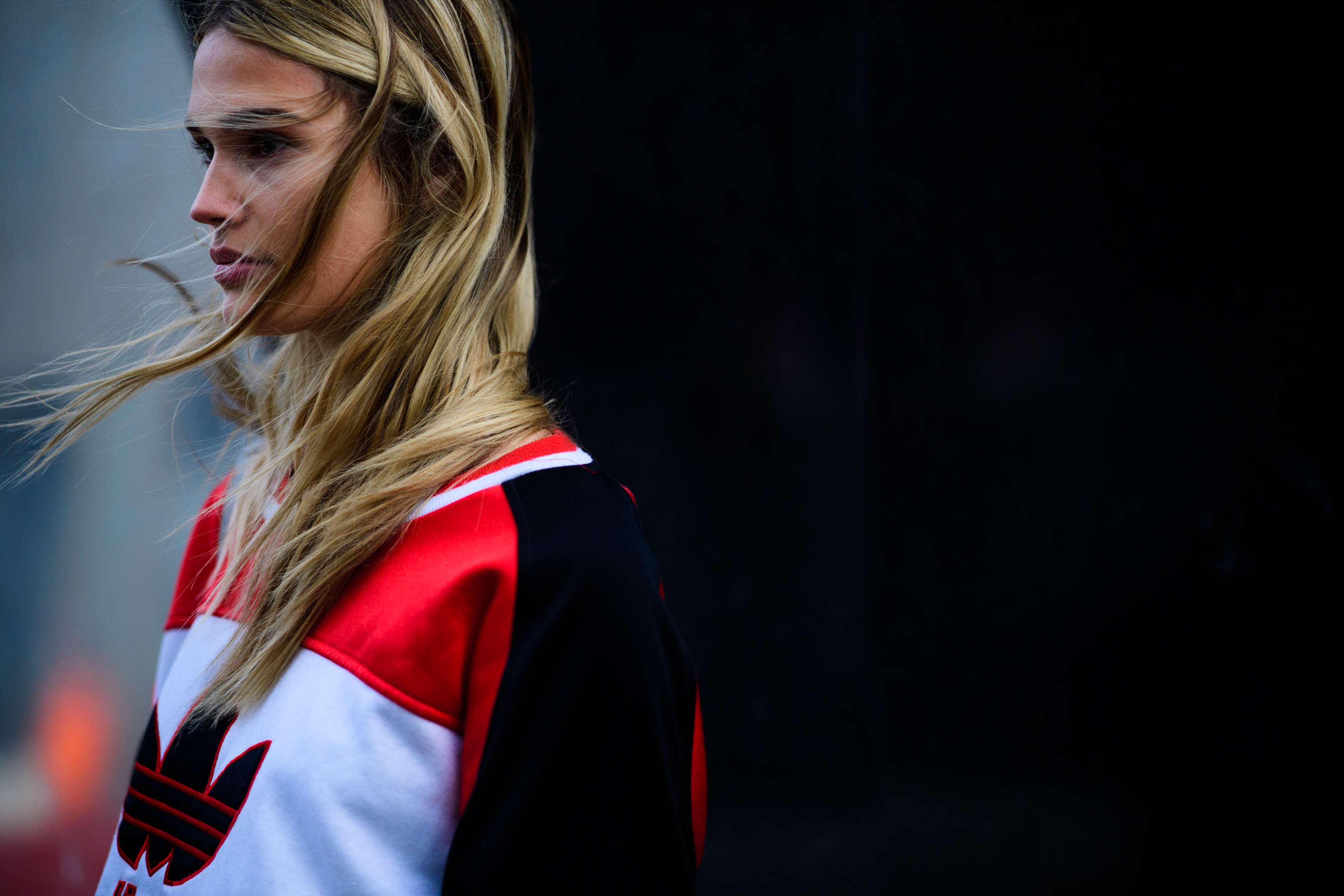 Woman wearing Adidas hoodie