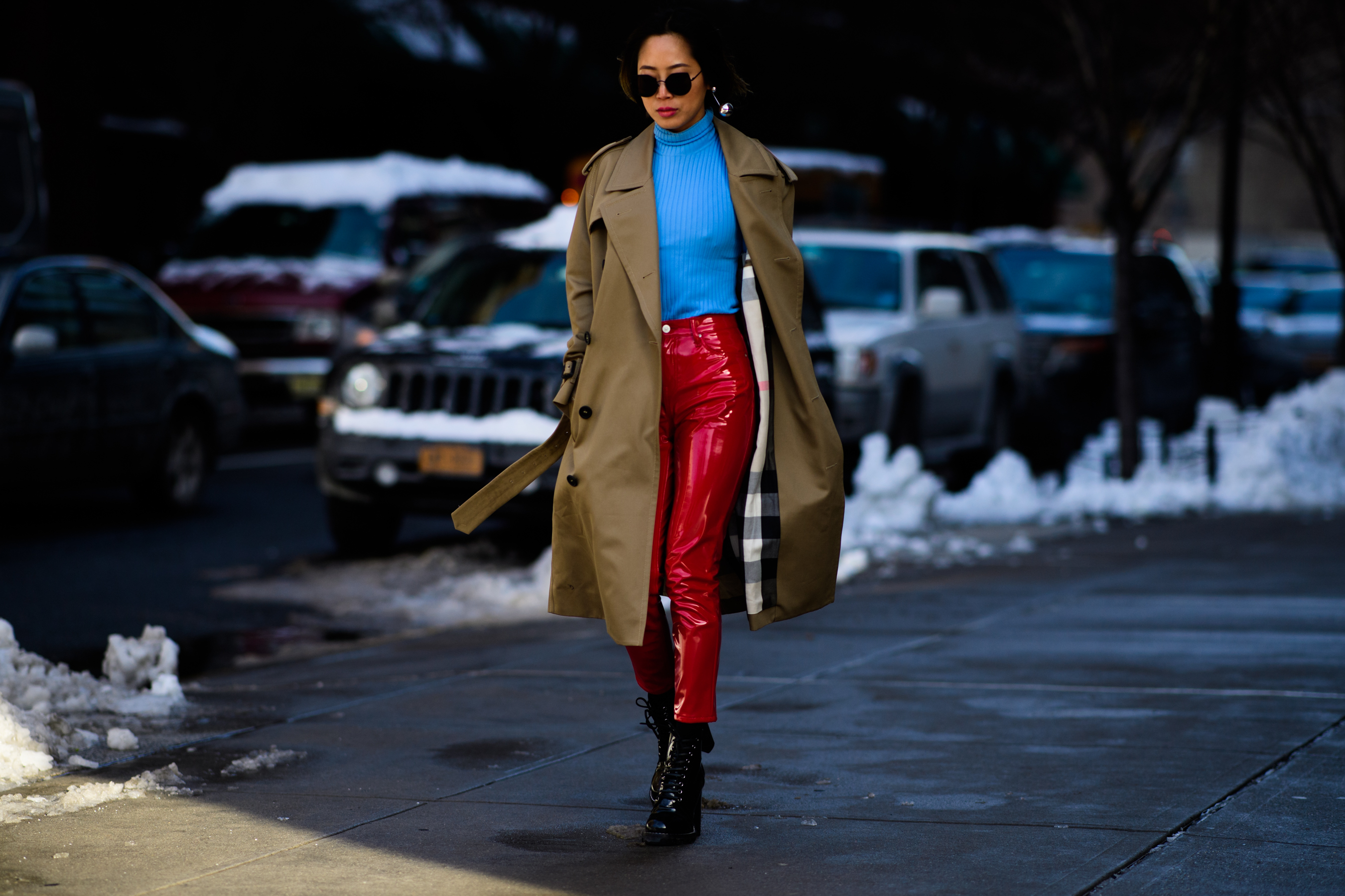 Woman wearing LV red pants