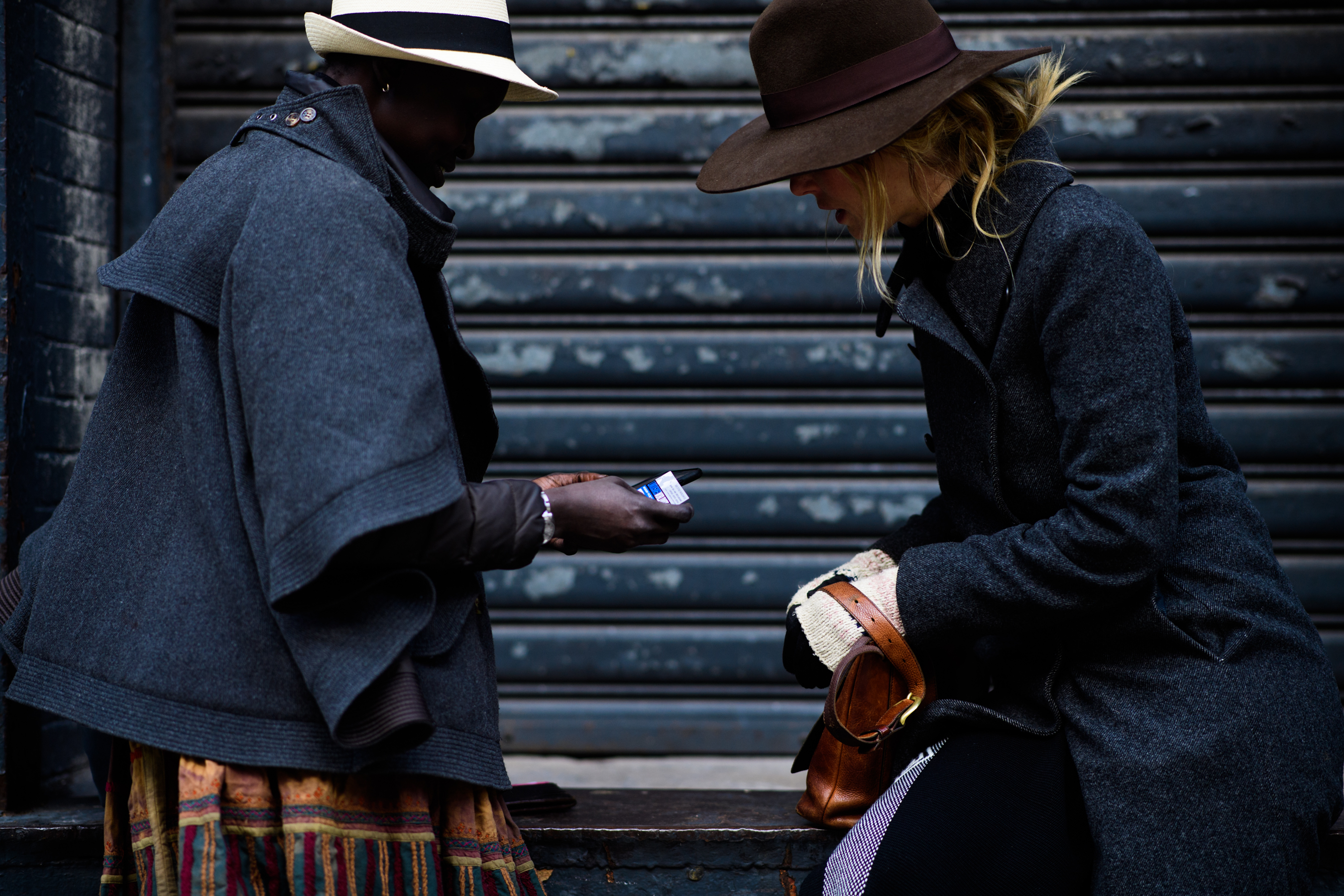 Two models wearing vintage clothes