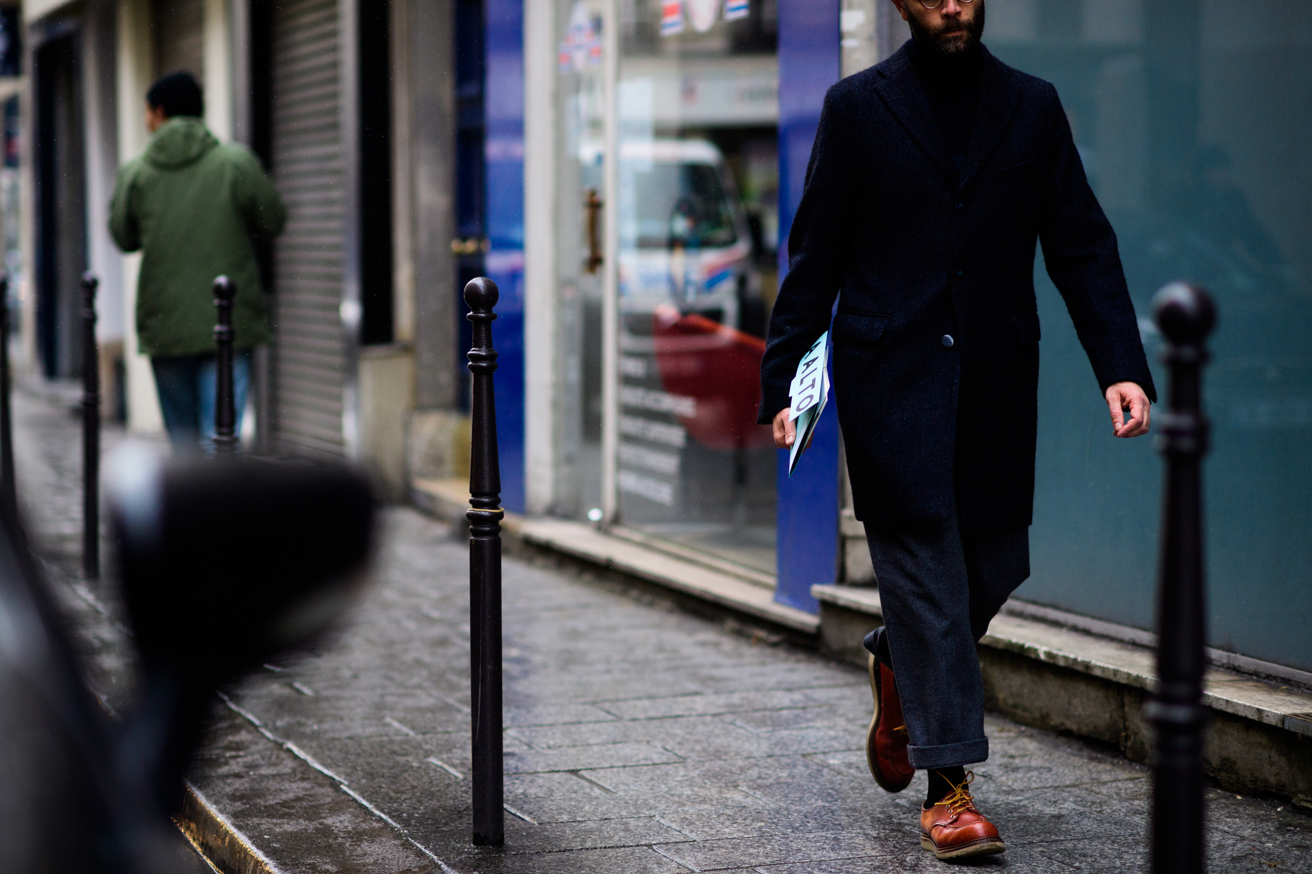Fashion journalist wearing black coat