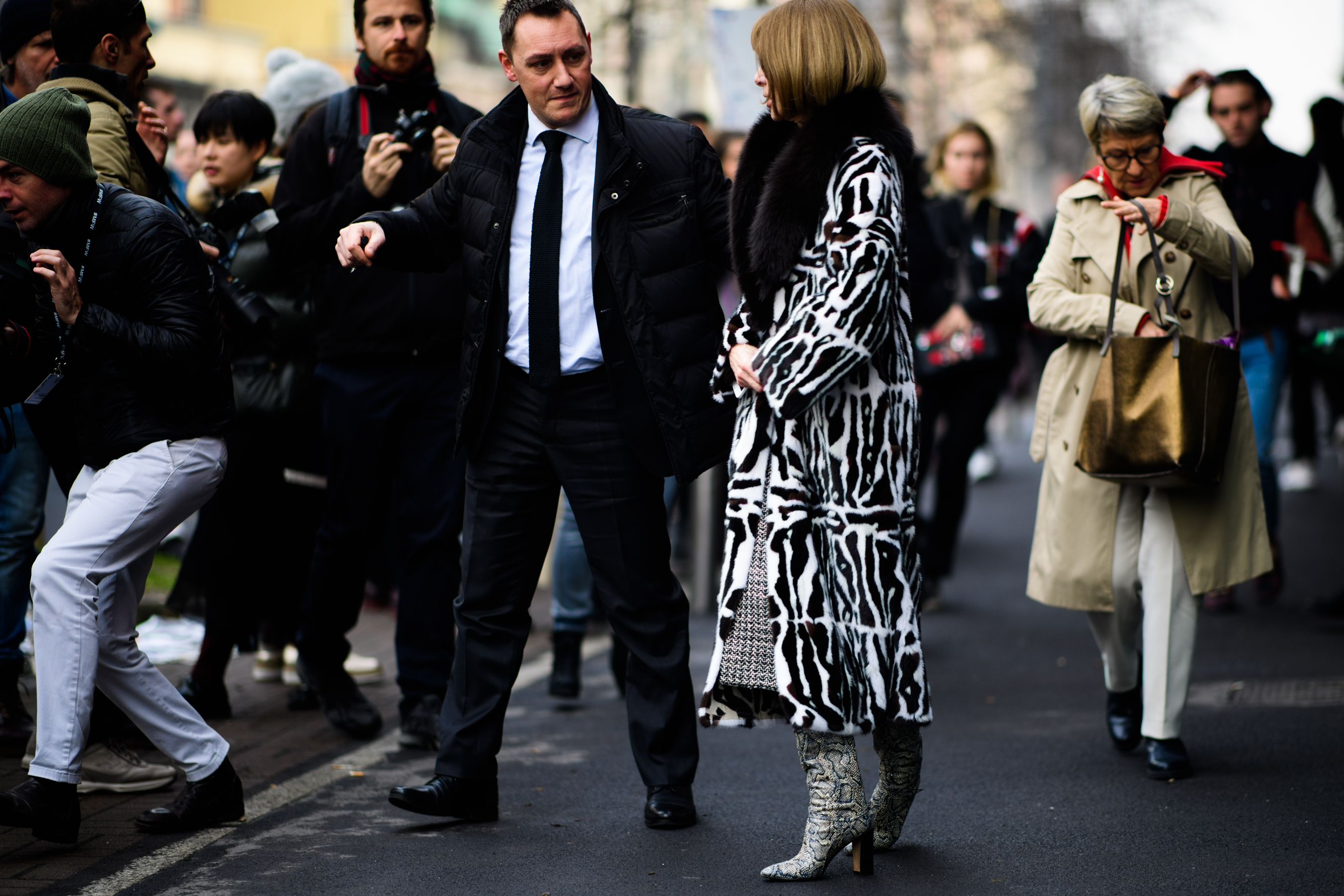 British-American journalist and editor wearing zebra coat