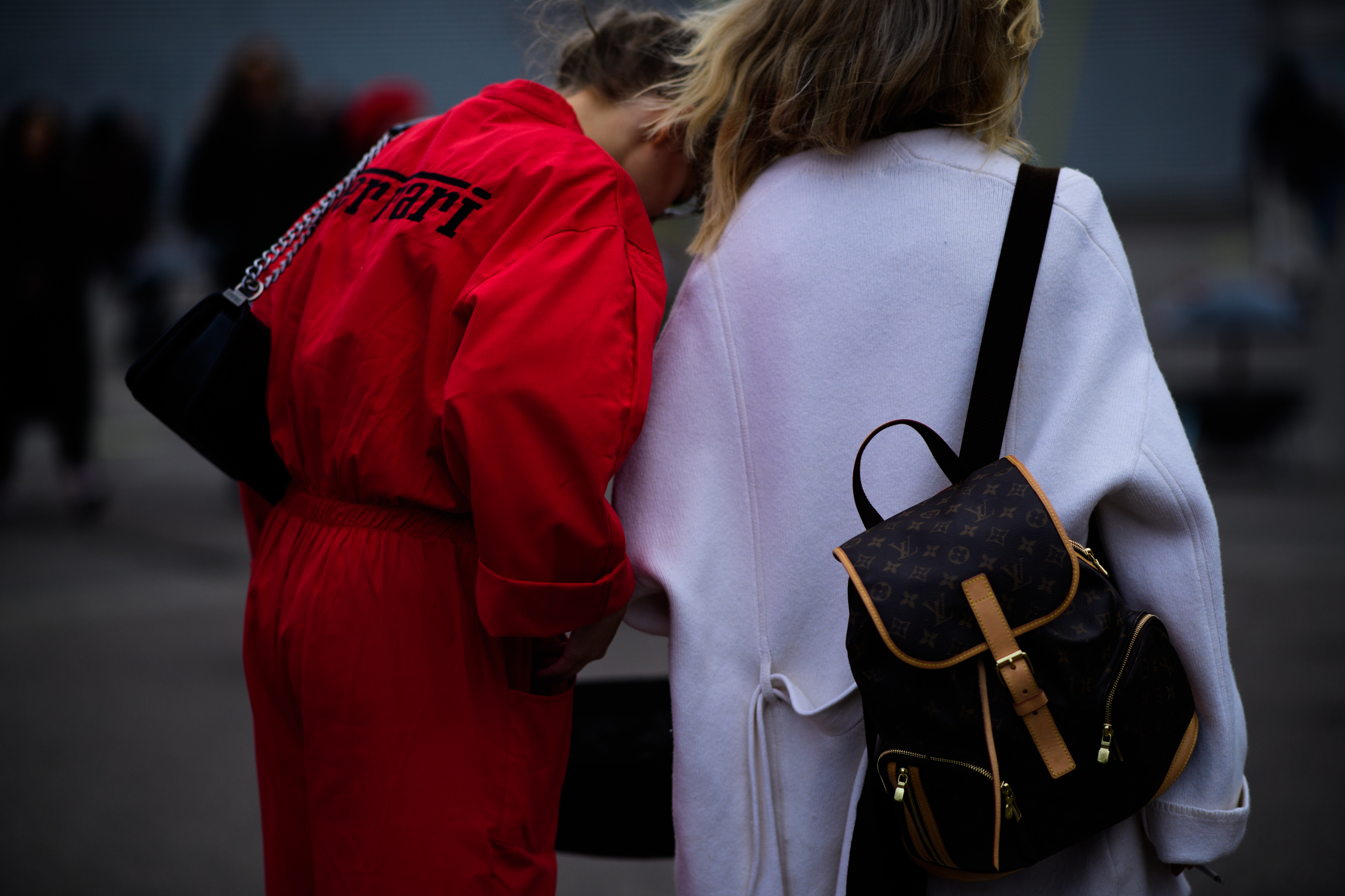 Woman with Louis Vuitton backpack