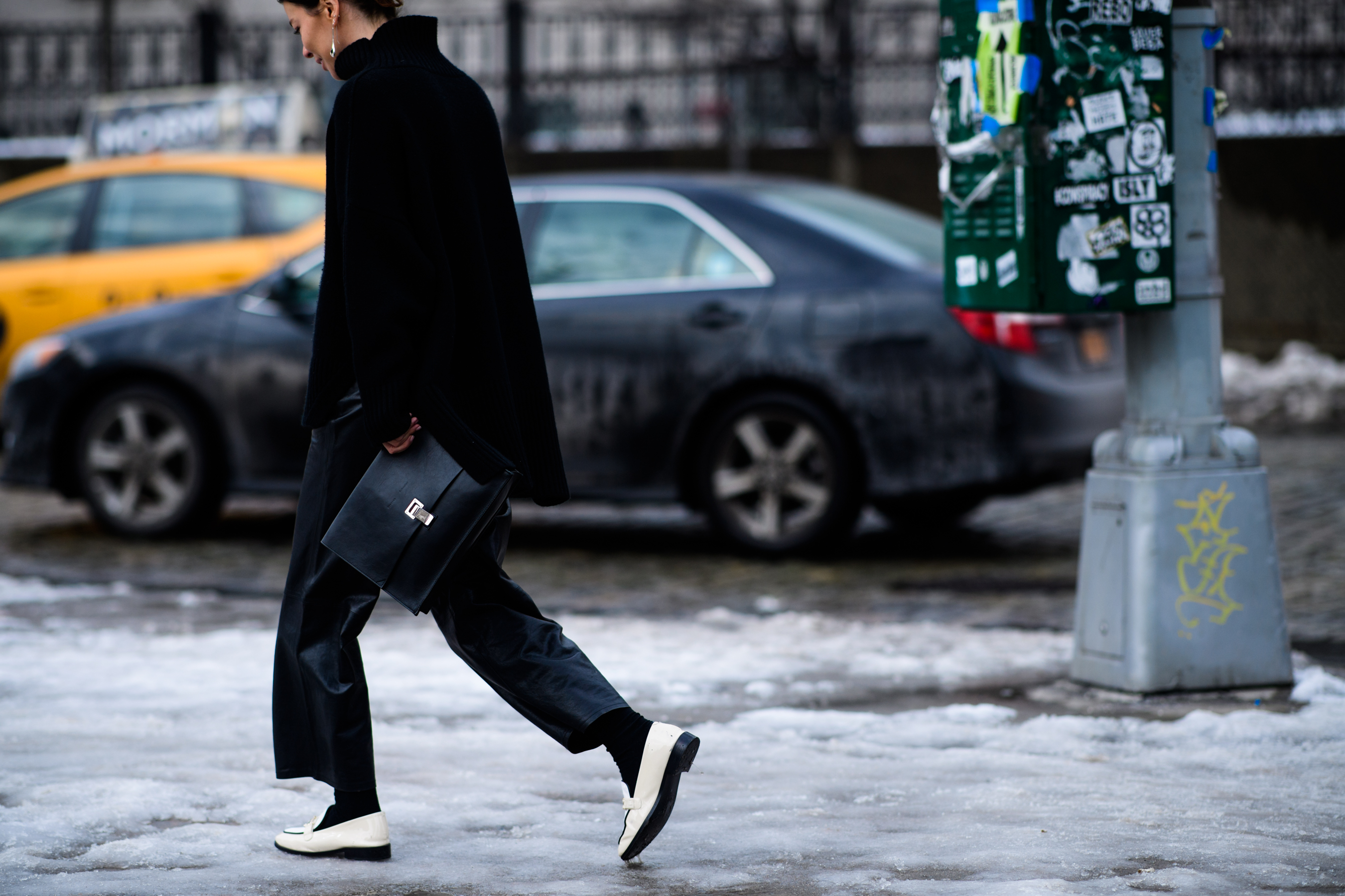 Woman wearing white shoes