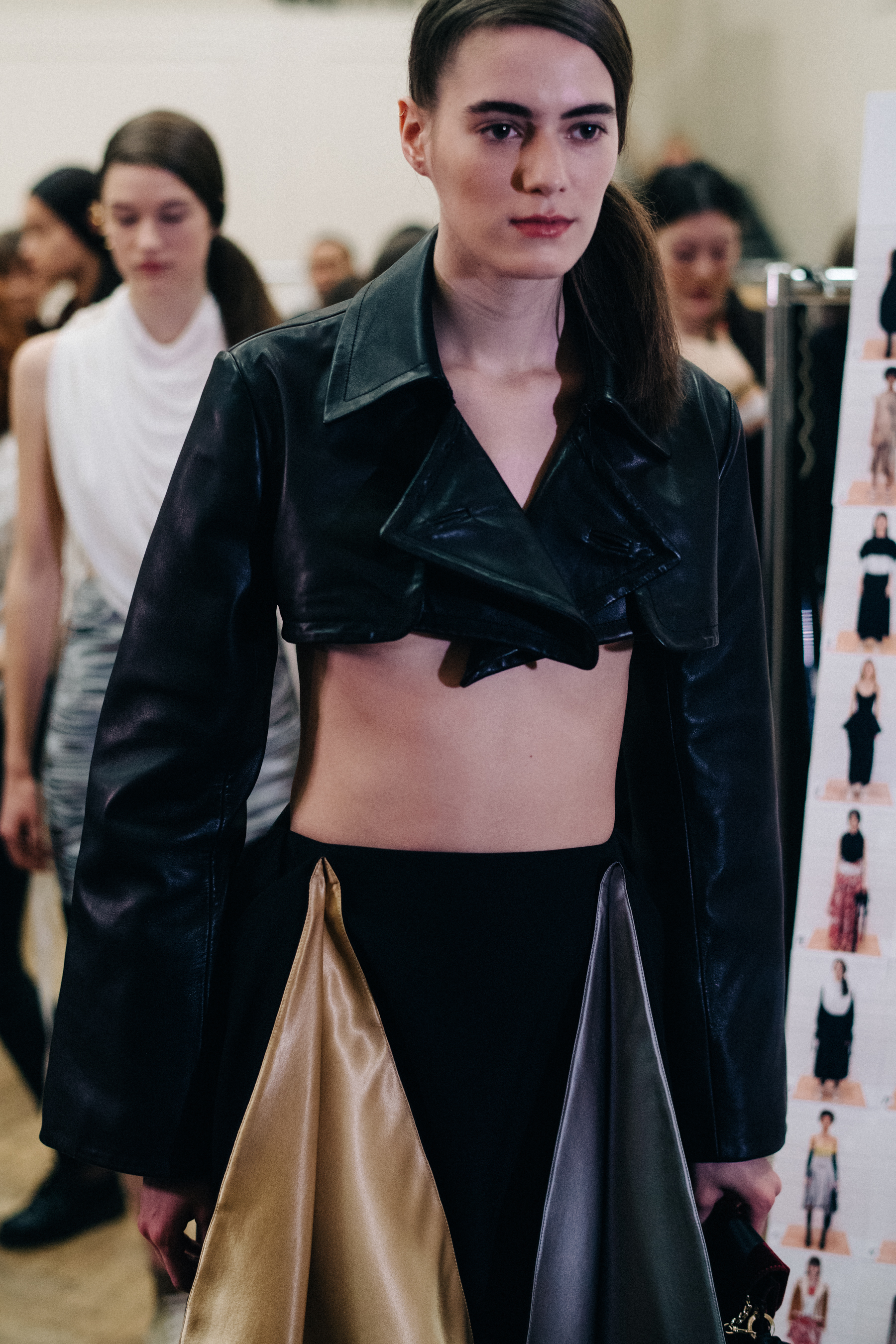 Lea Issarni wearing short leather jacket