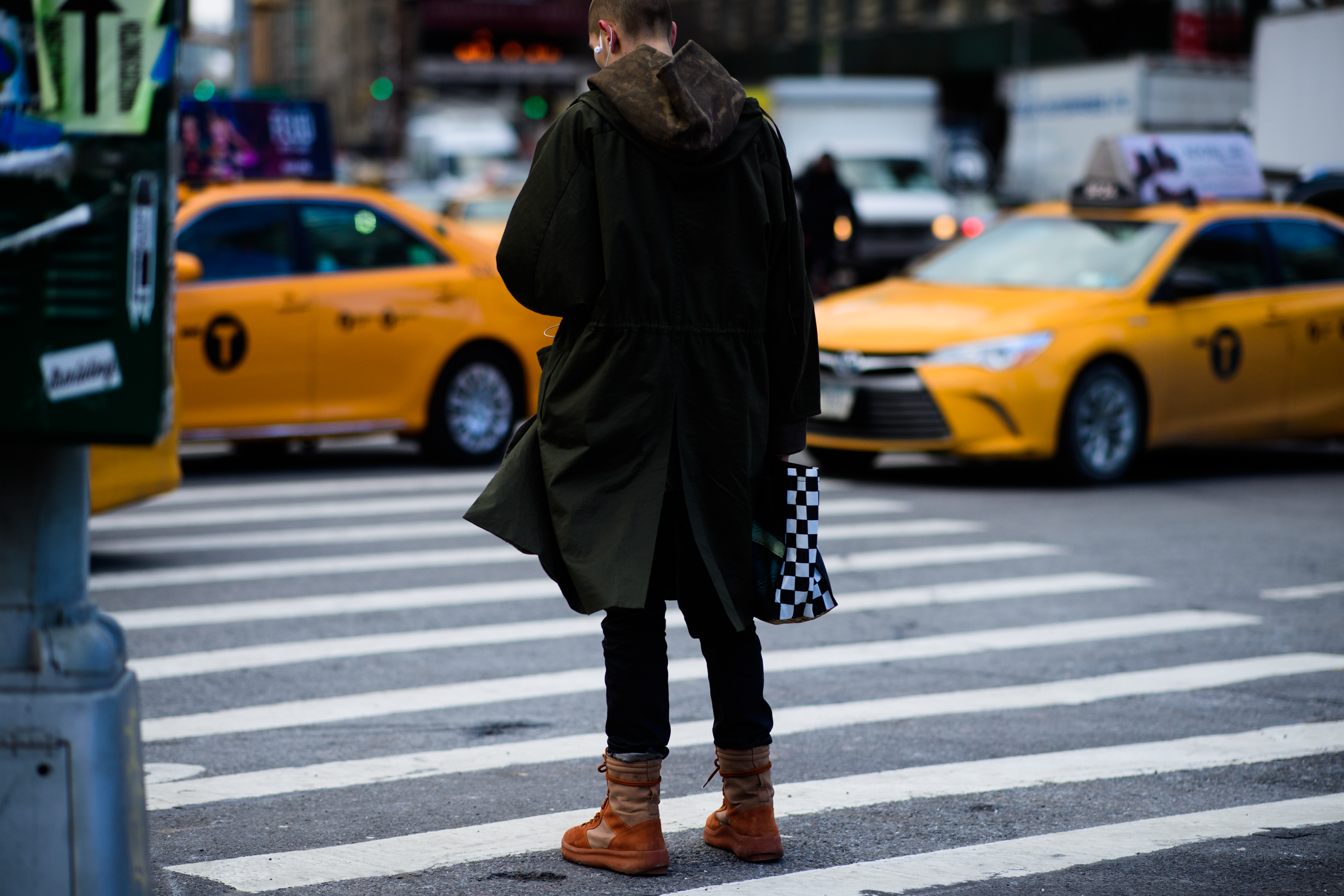 Man wearing Yeezy boots and parka