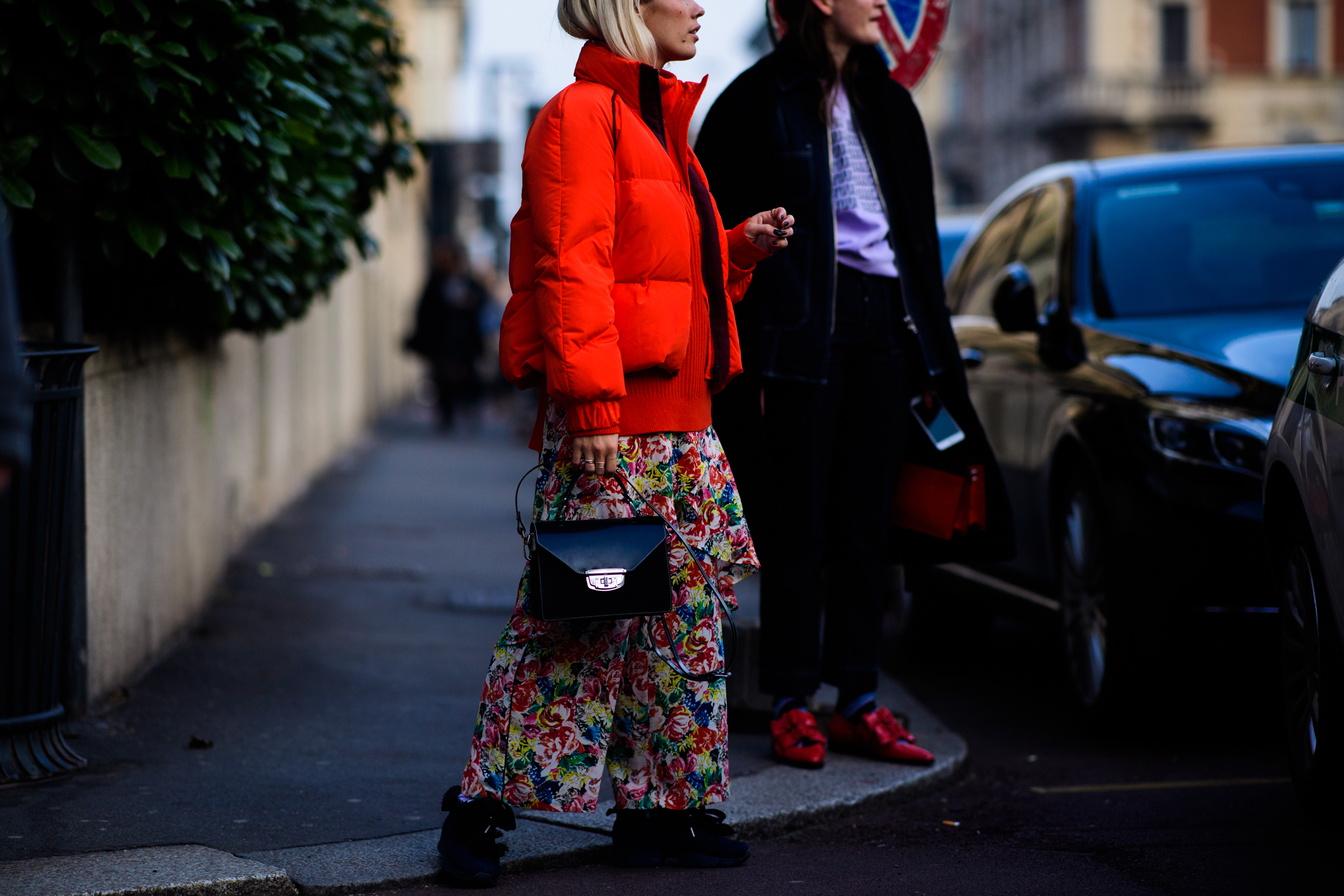Woman wearing red puffer jacket