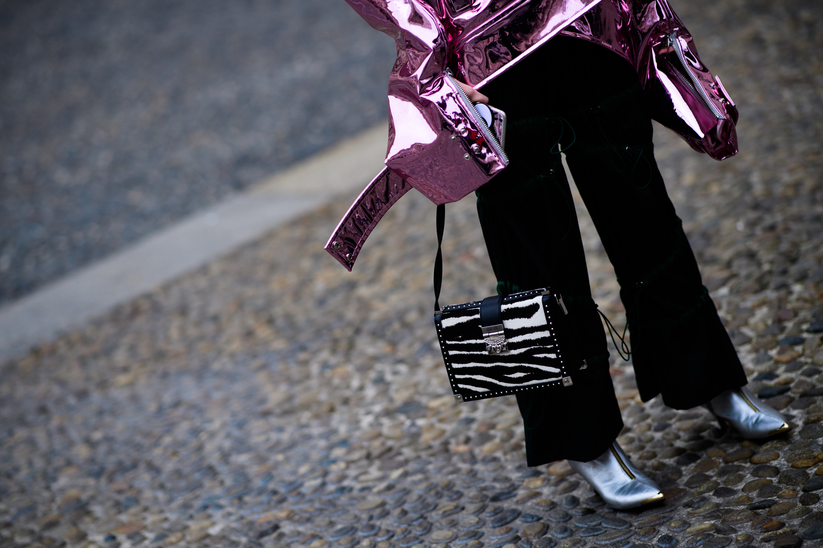 Woman wearing pink reflective jacket