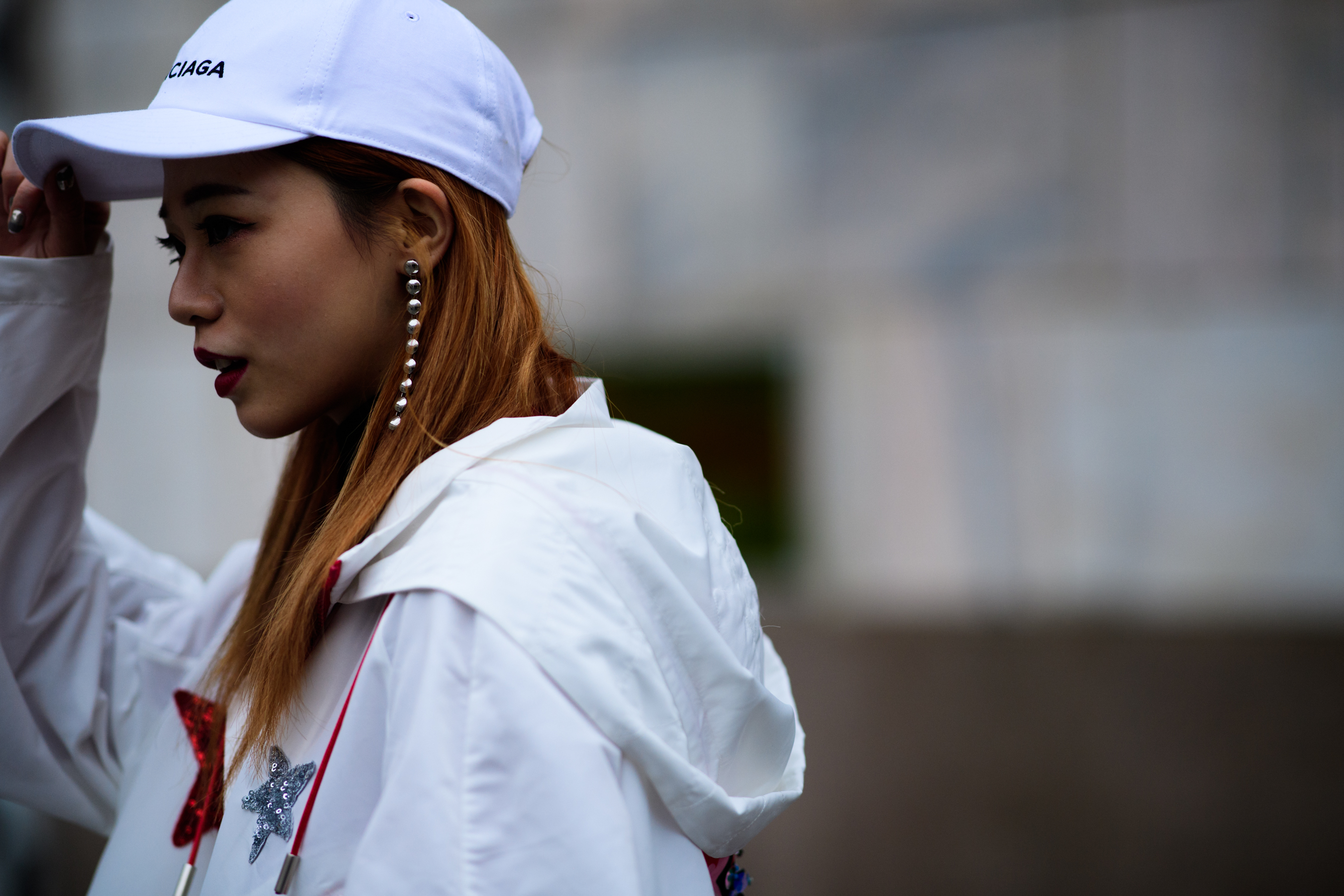 Woman wearing Balenciaga hat