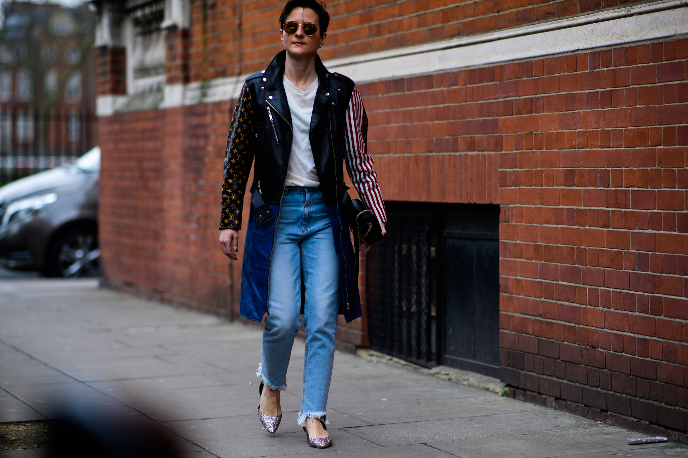 Woman wearing Louis Vuitton jacket