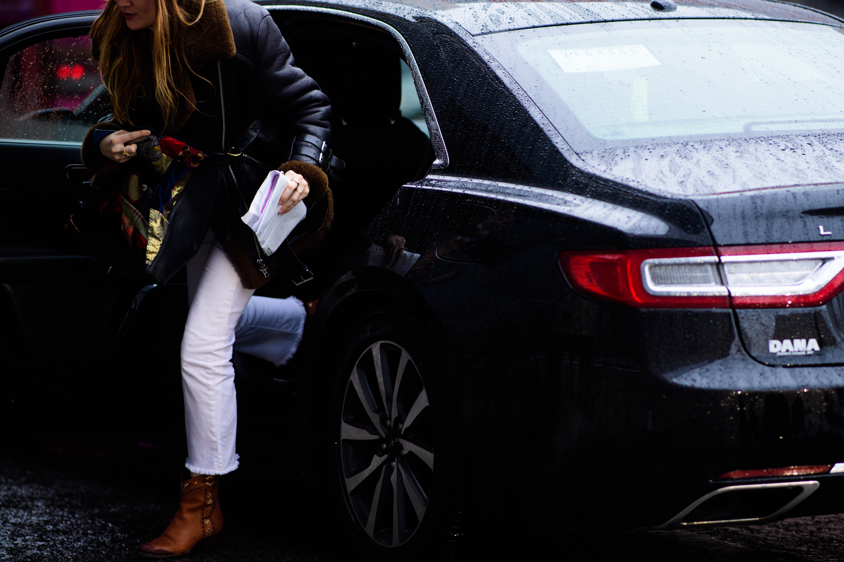 Woman getting out of the car