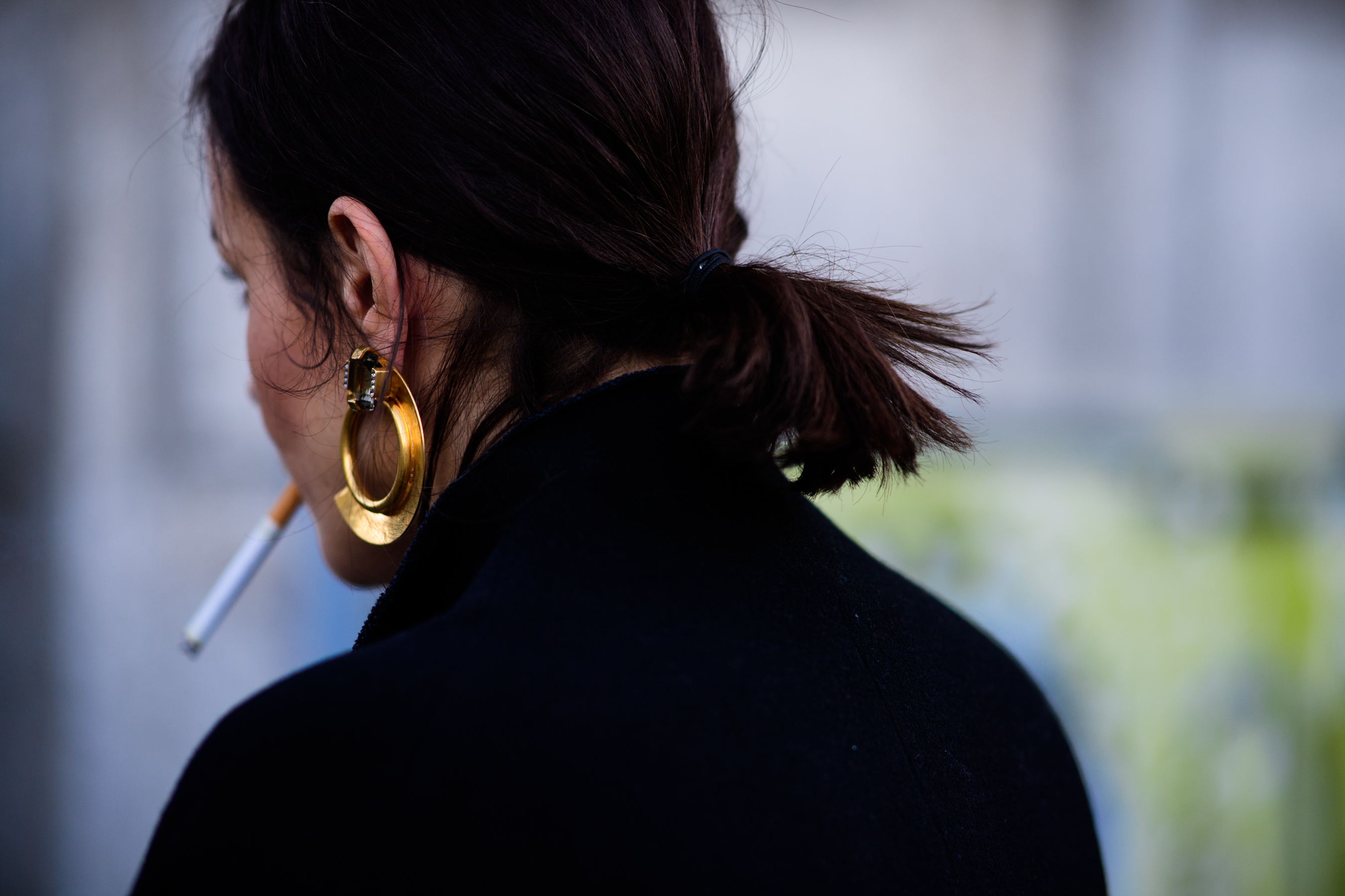 Woman wearing golden earring