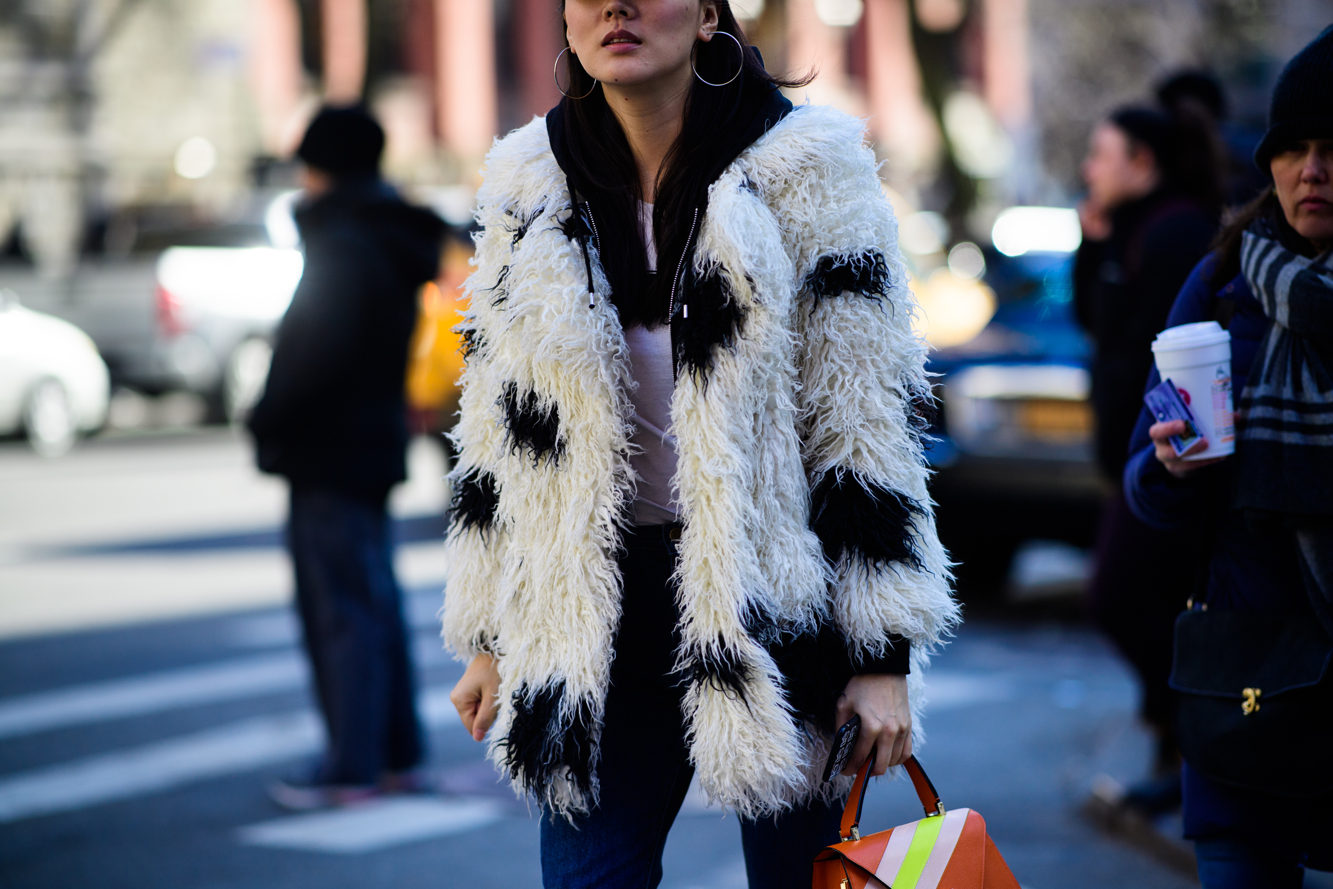 Woman wearing fur jacket