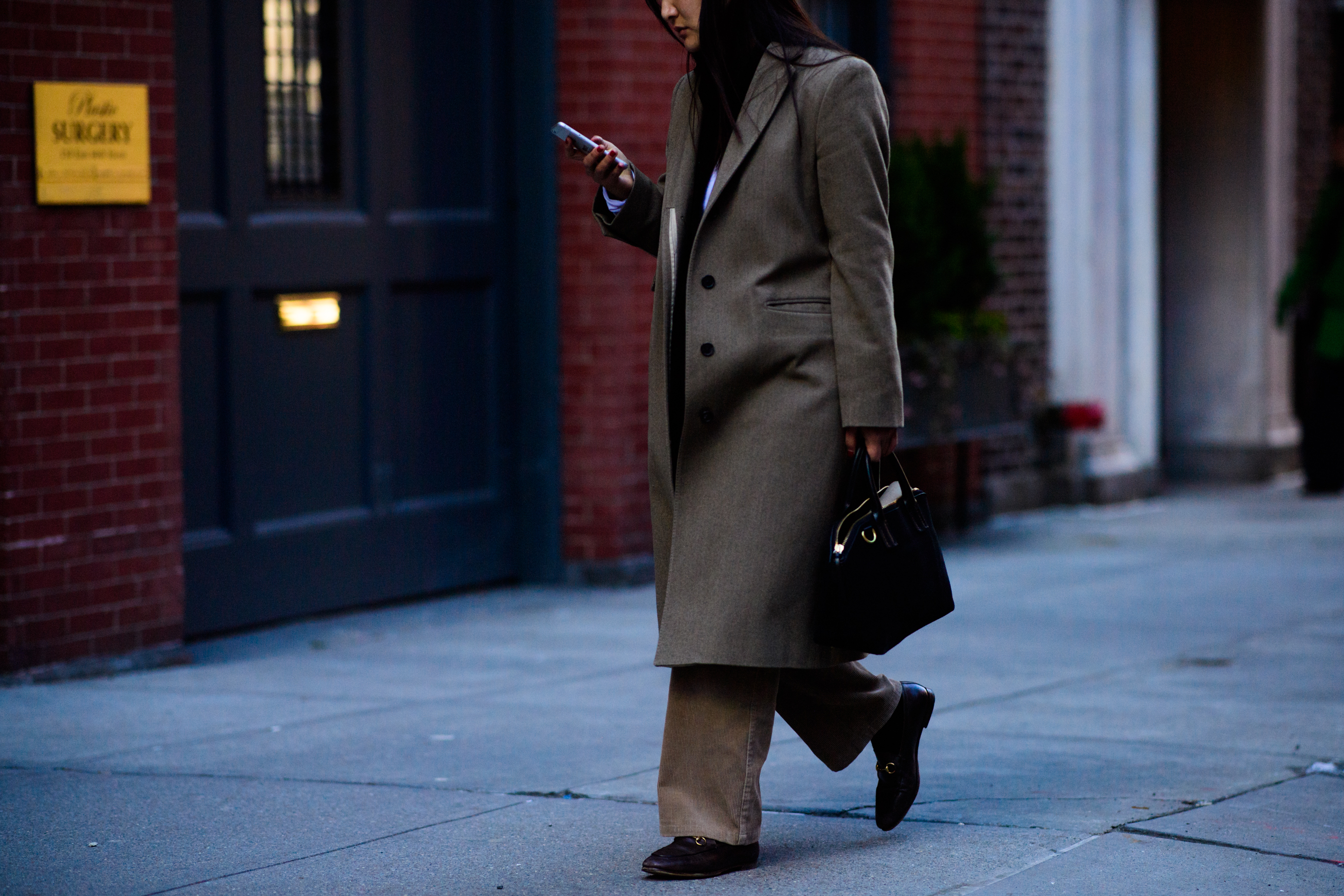 Woman wearing Gucci shoes