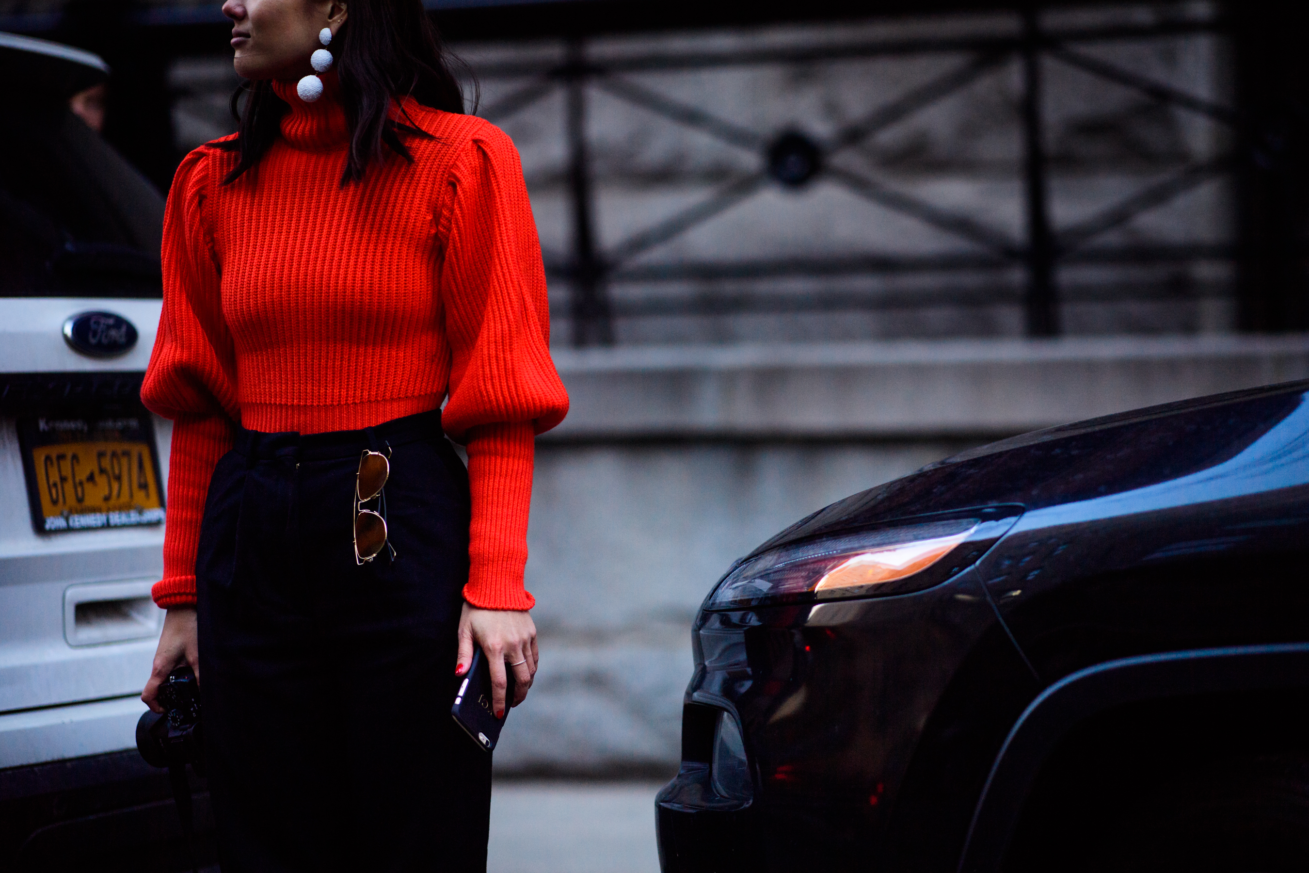 Woman wearing red sweater