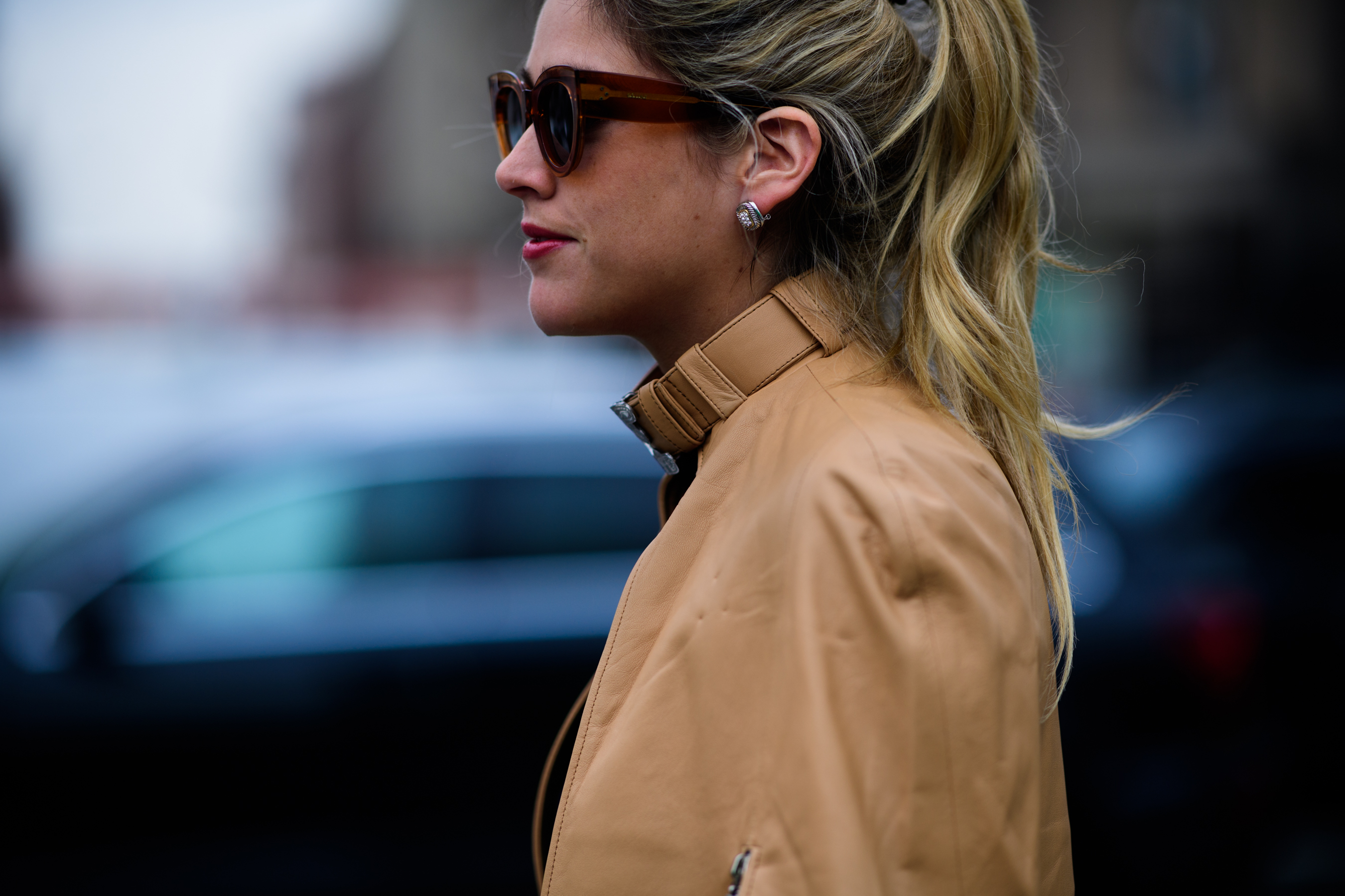 Woman wearing brown coat