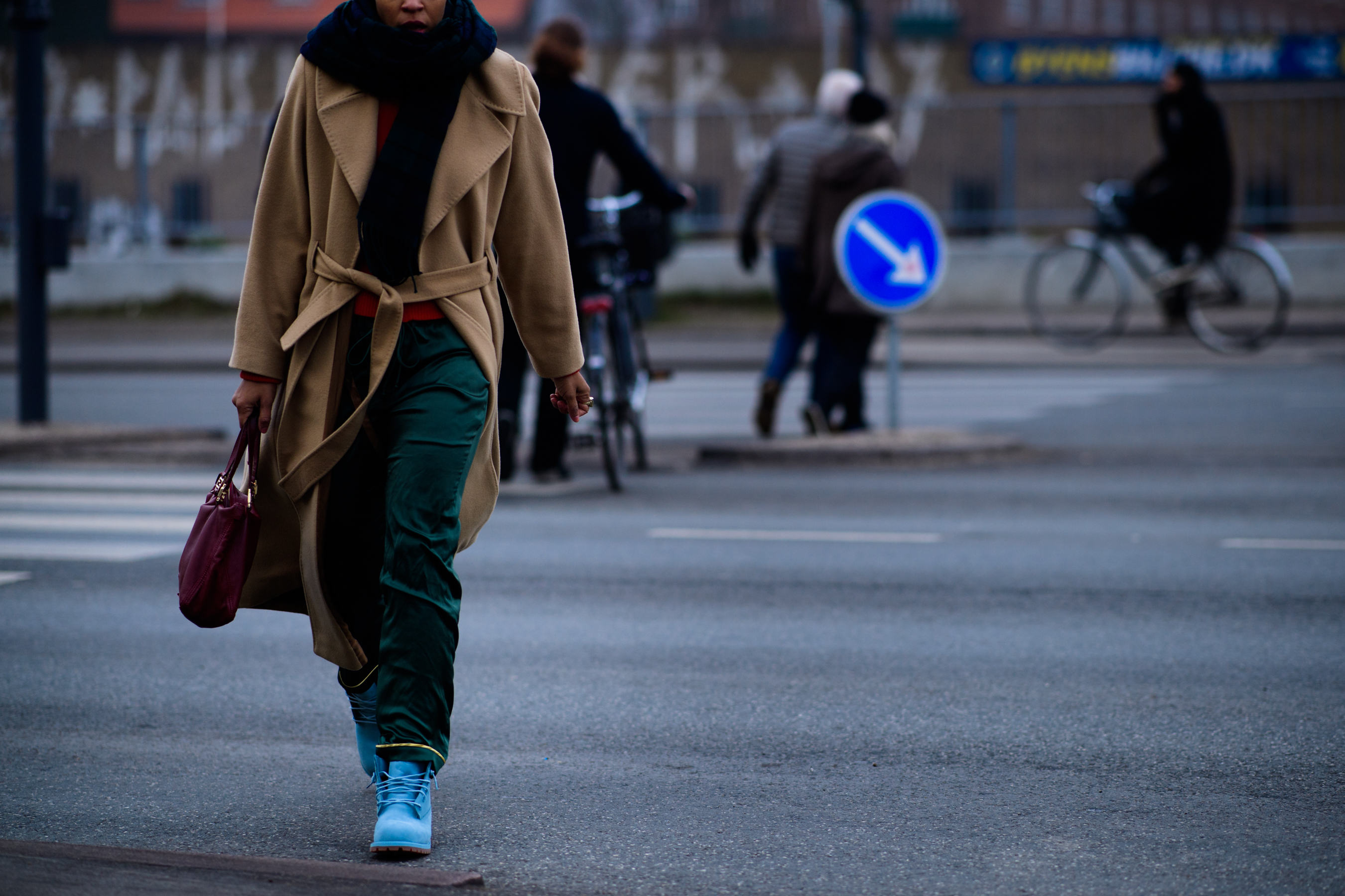 Woman wearing brown coat