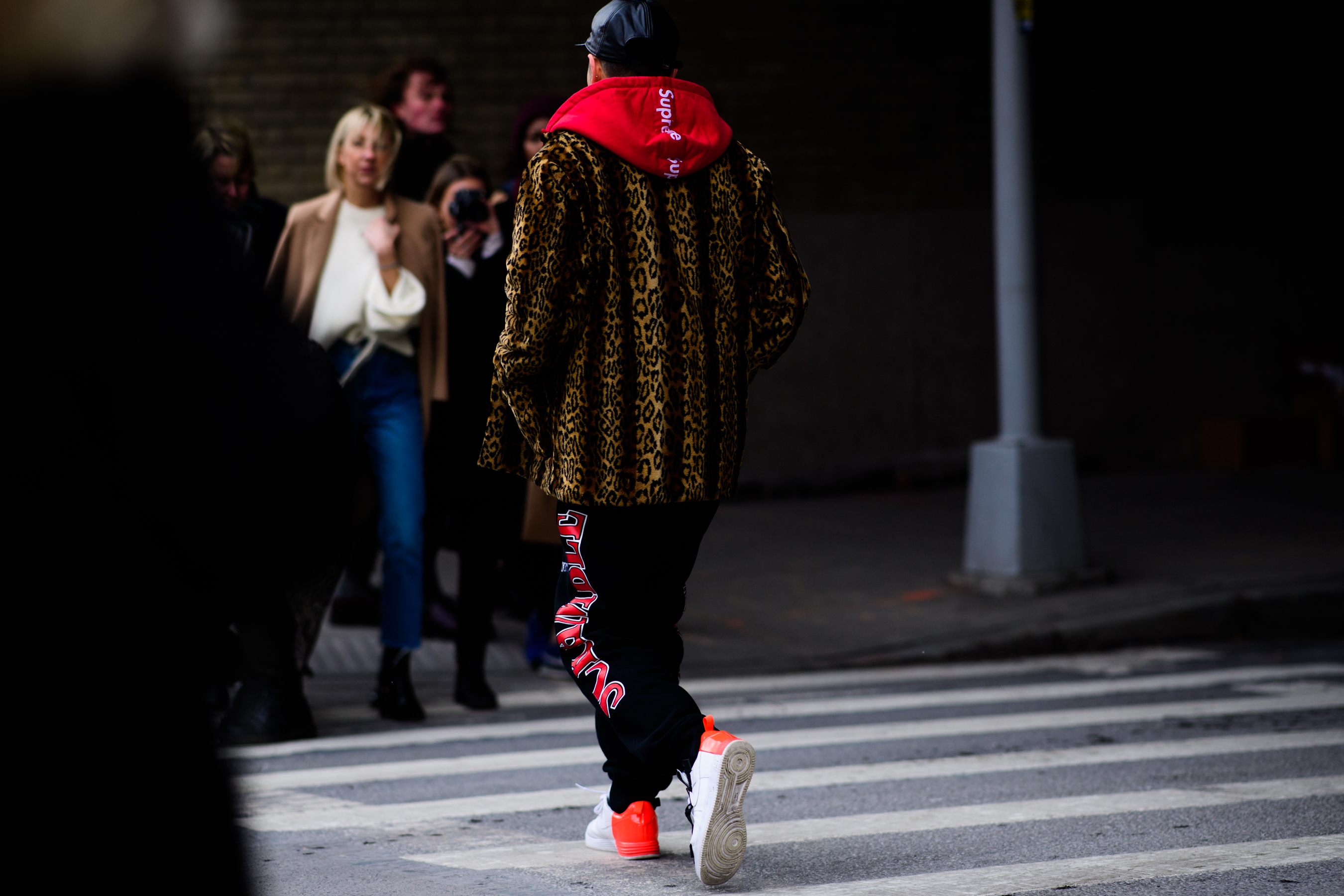Man wearing Supreme hoodie