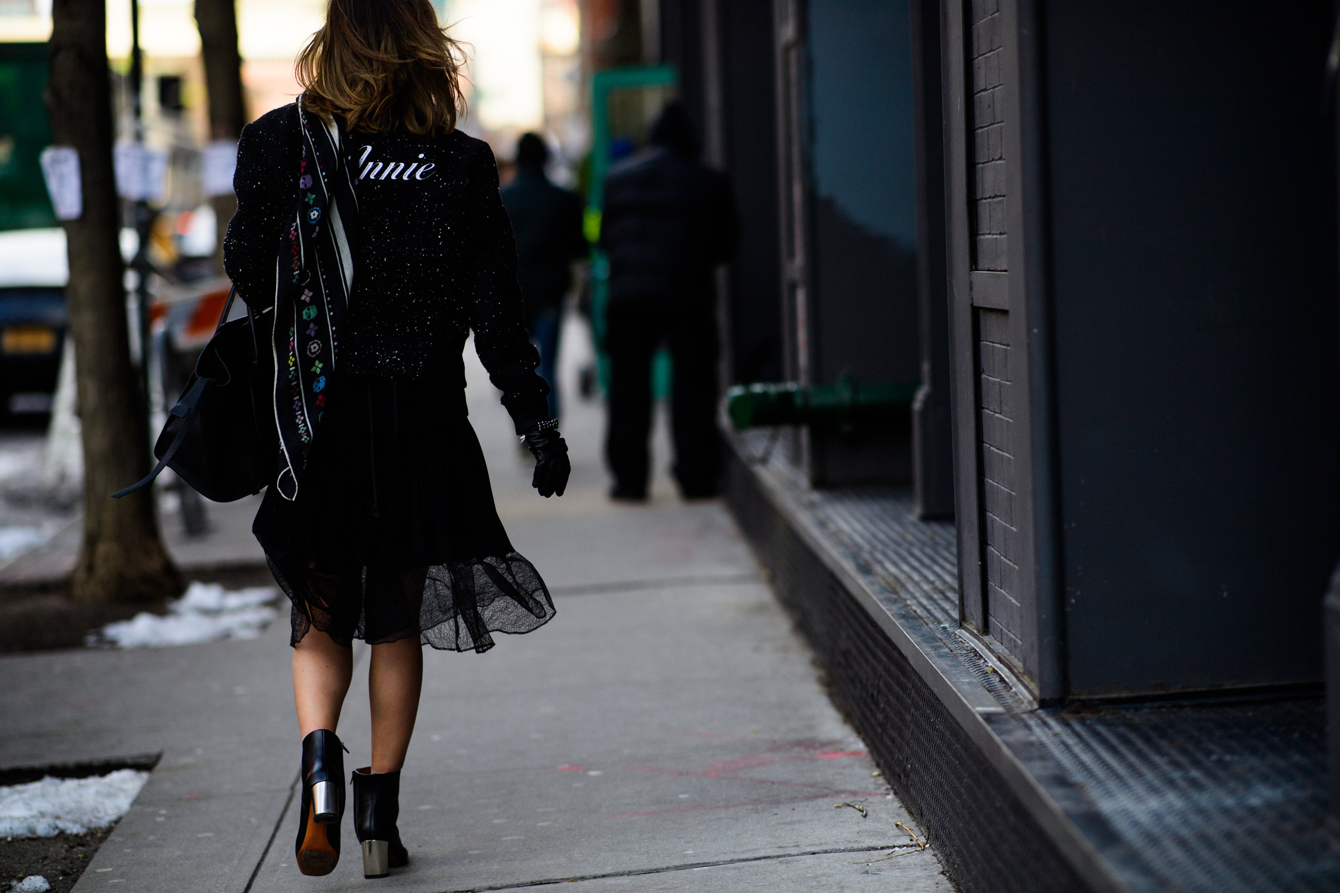Woman wearing silver heel boots
