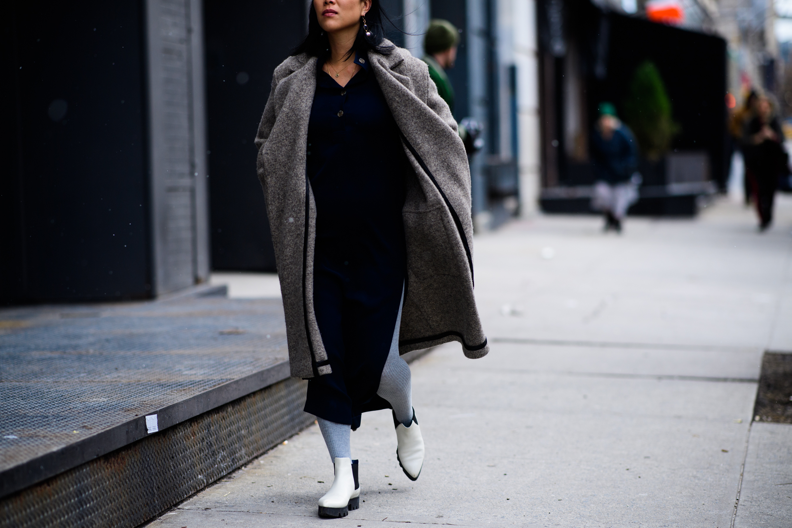 Woman wearing grey coat