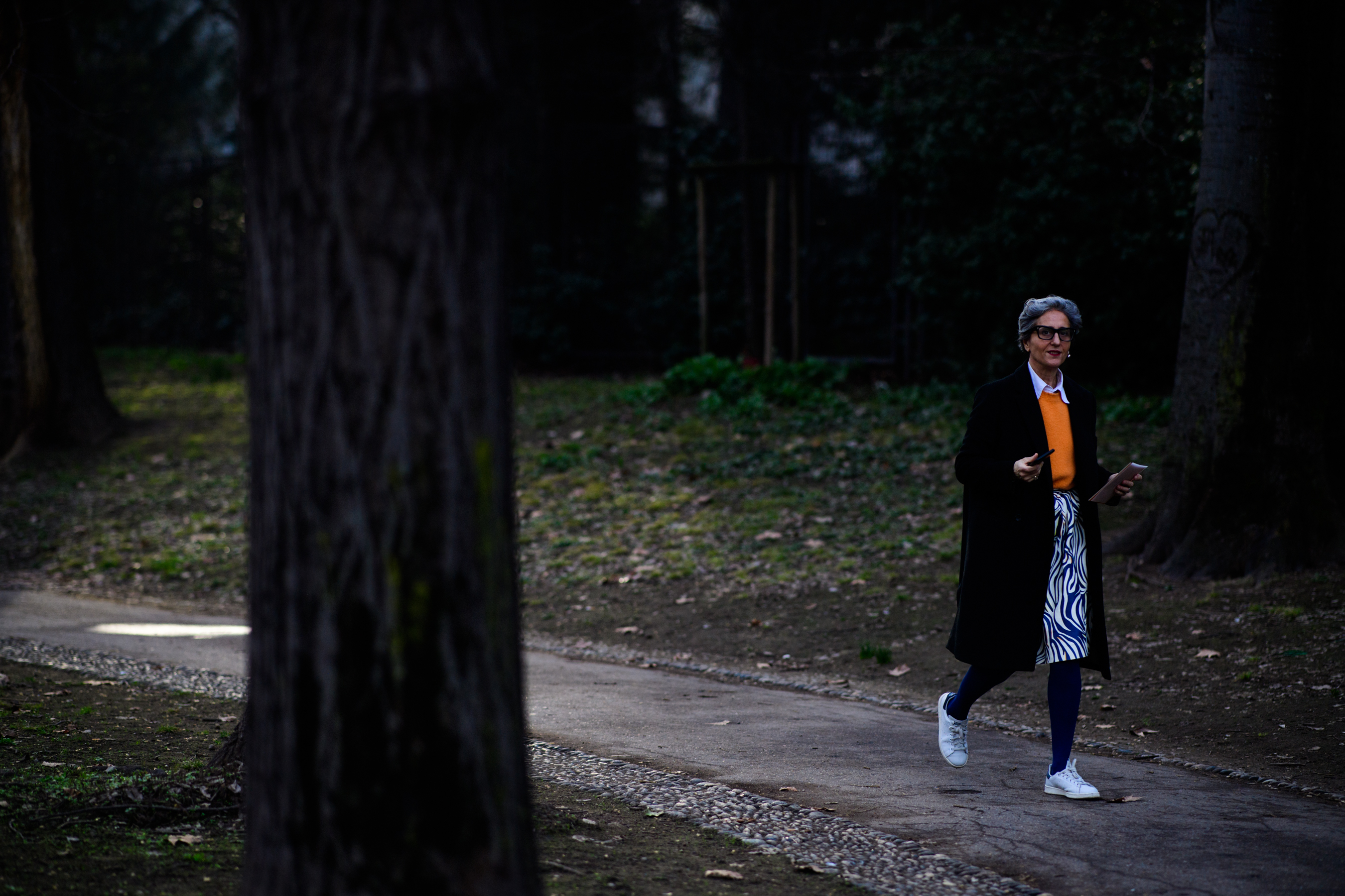 Woman wearing adidas pants