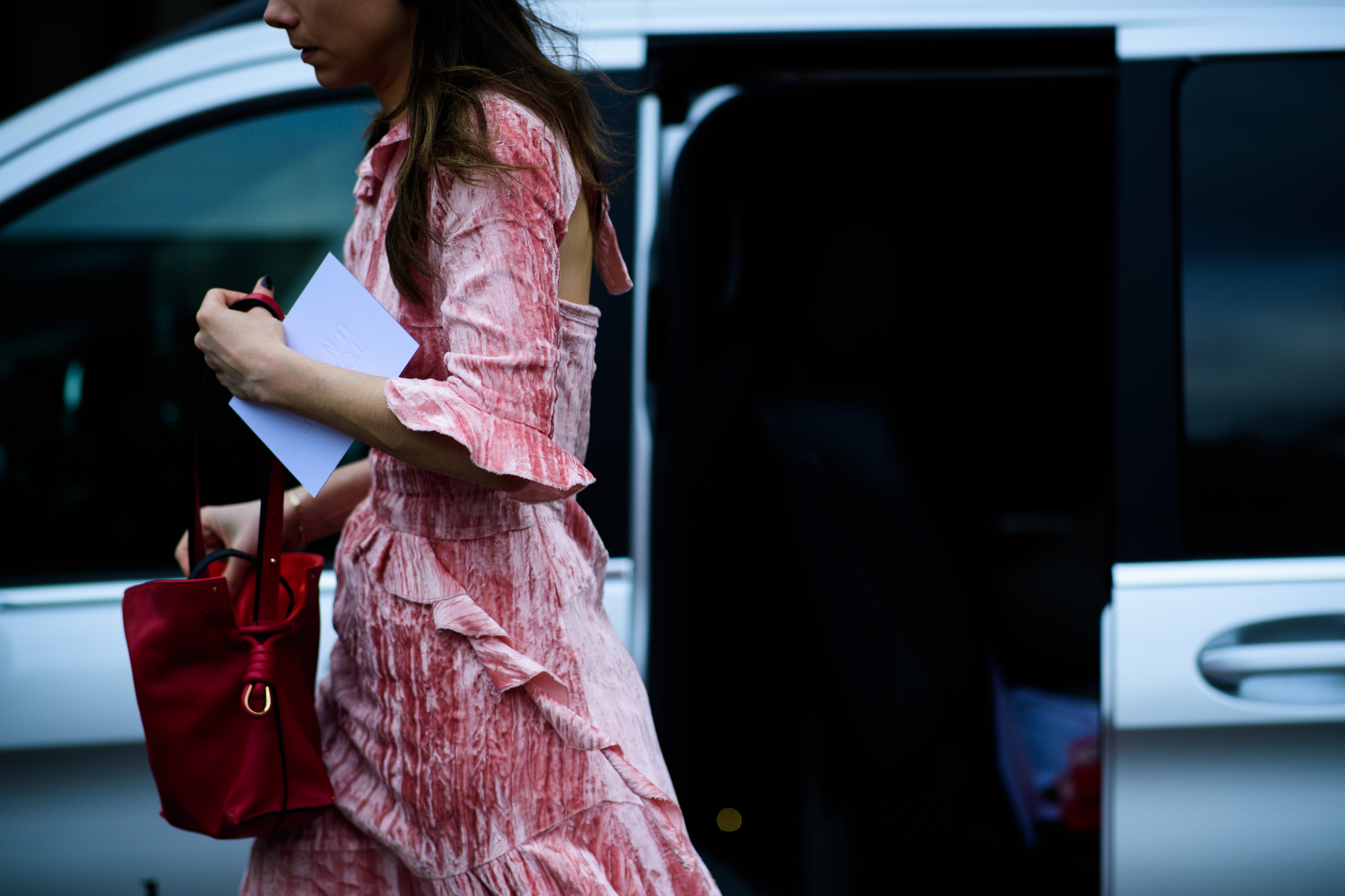 Junior fashion editor of Harper's BAZAAR wearing Loewe bag and Rejinapyo