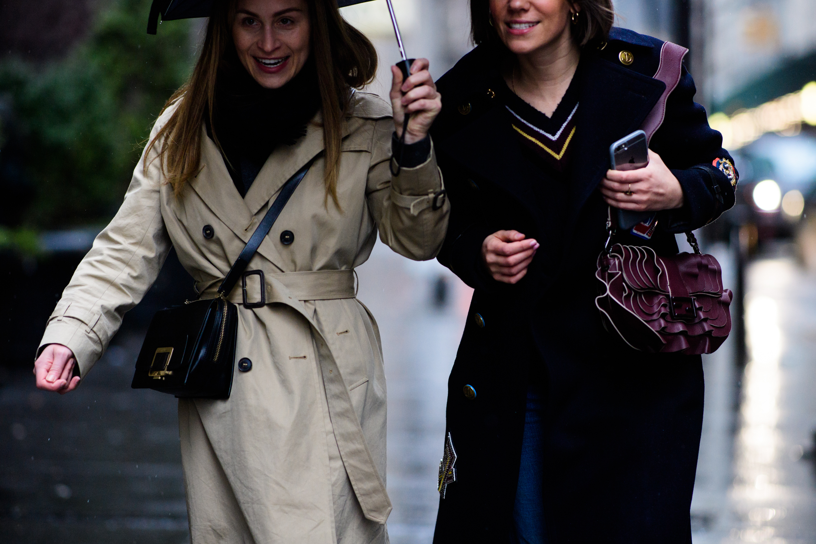 Two women with shoulder bags