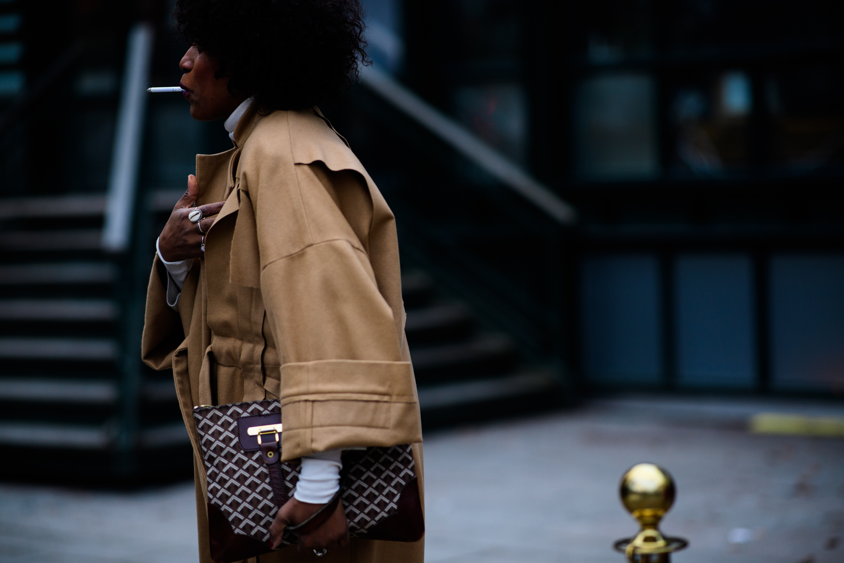 Woman wearing brown jacket