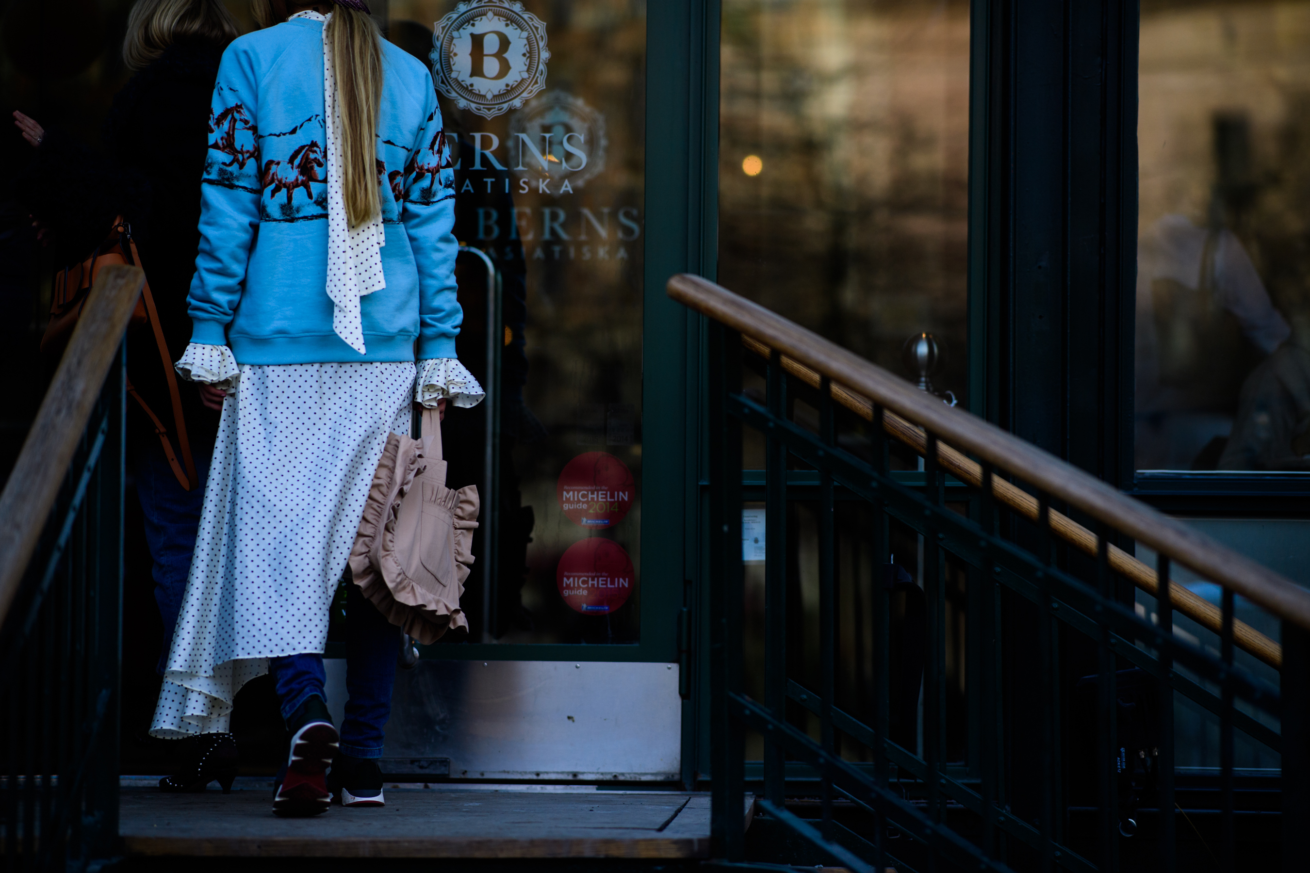 Woman wearing blue sweater