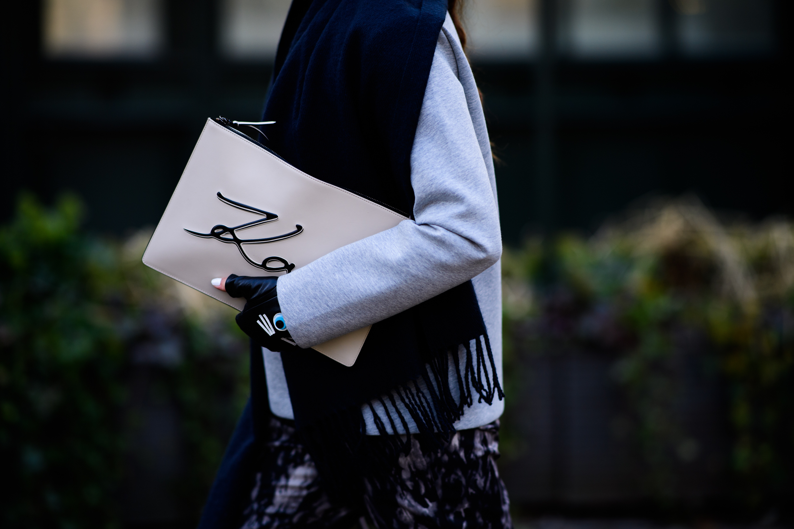 Woman wearing grey jacket