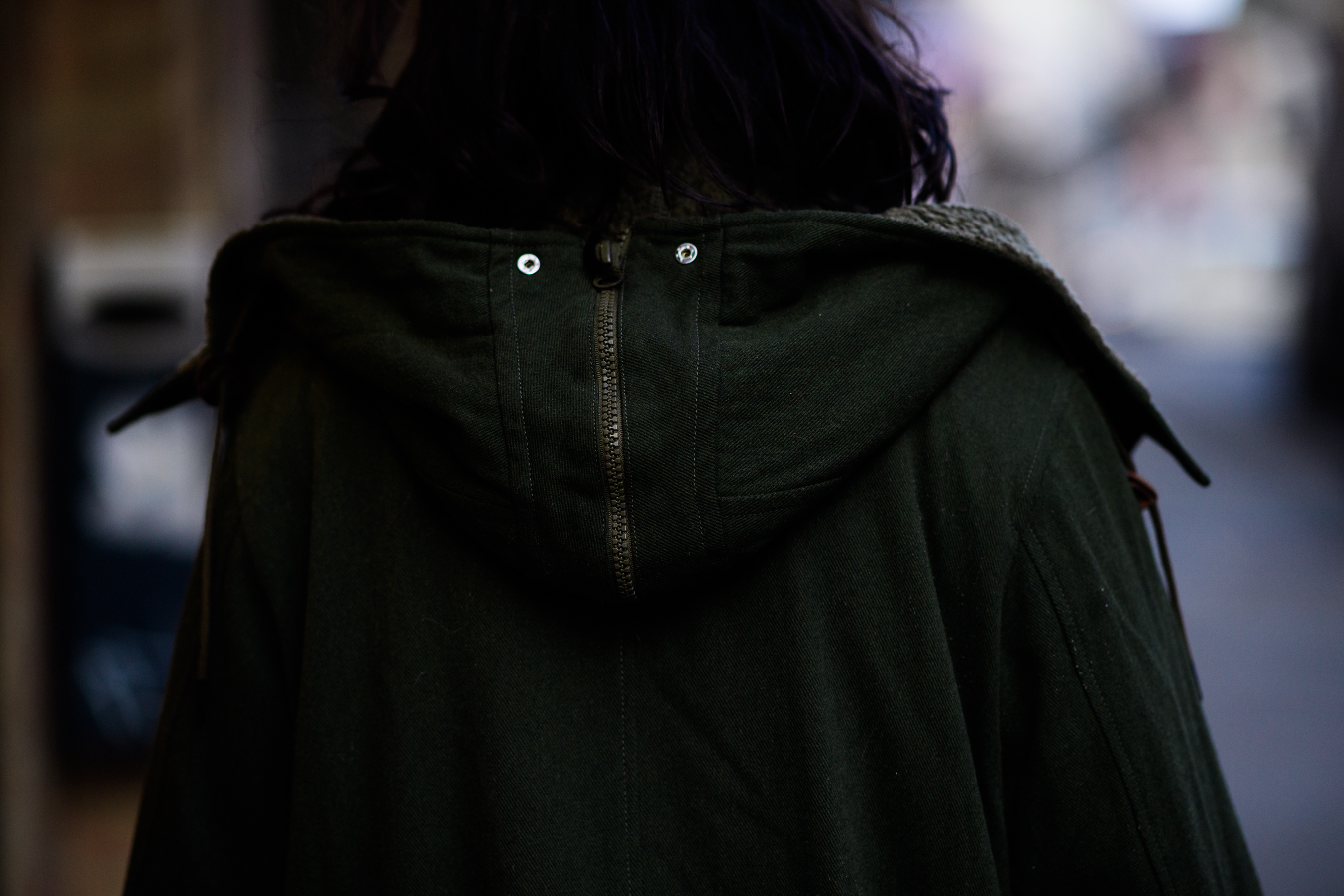 Man wearing green jacket