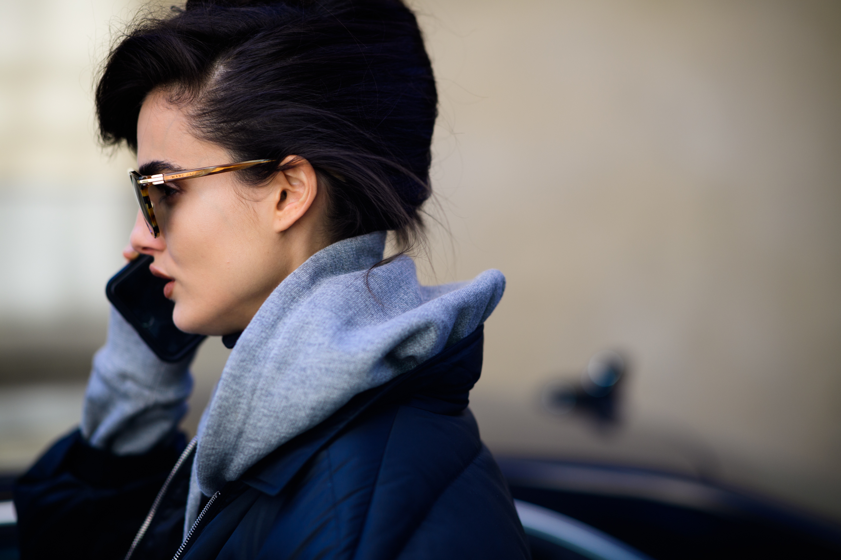 Model wearing grey hoodie