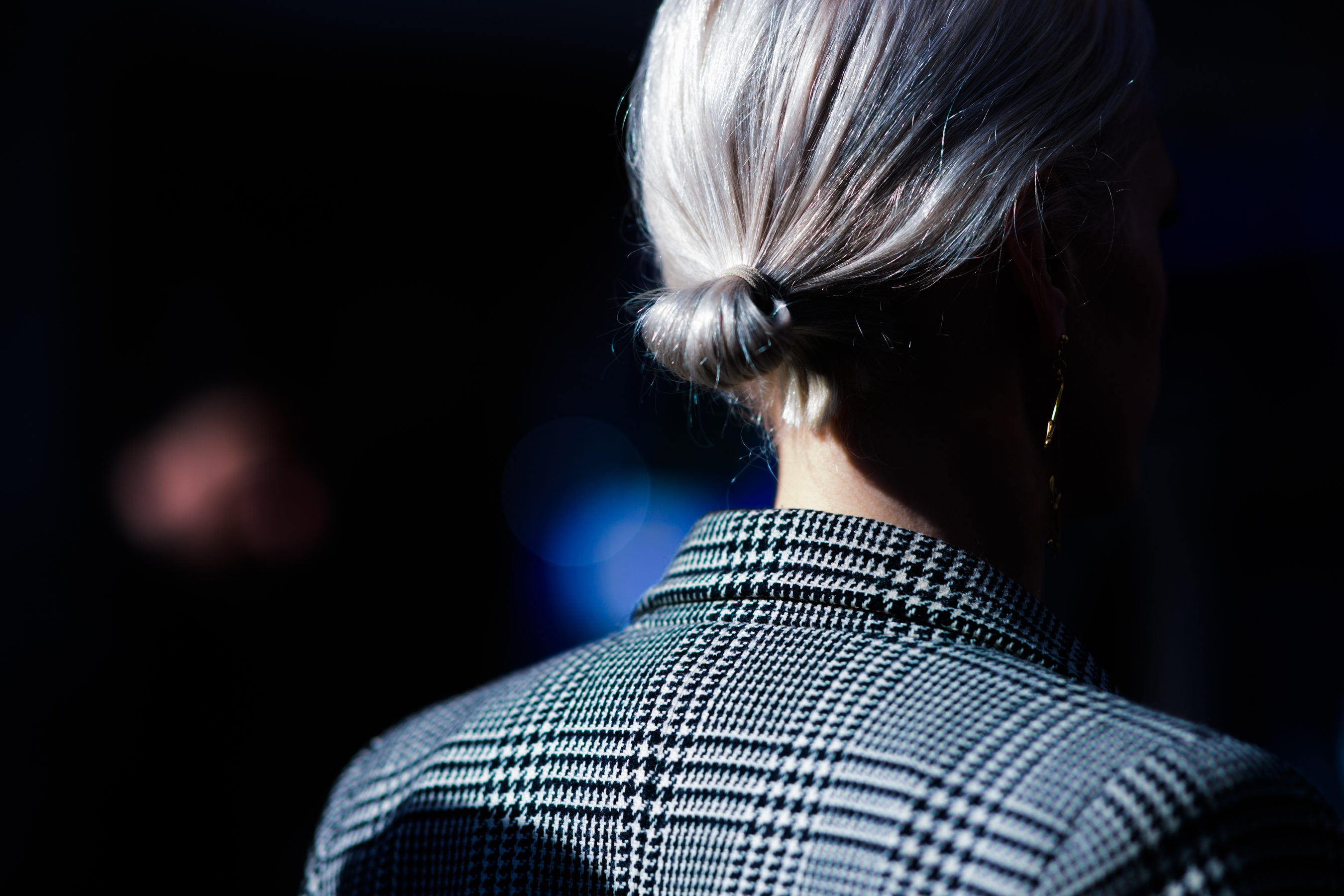 Woman with blonde hair wearing blazer