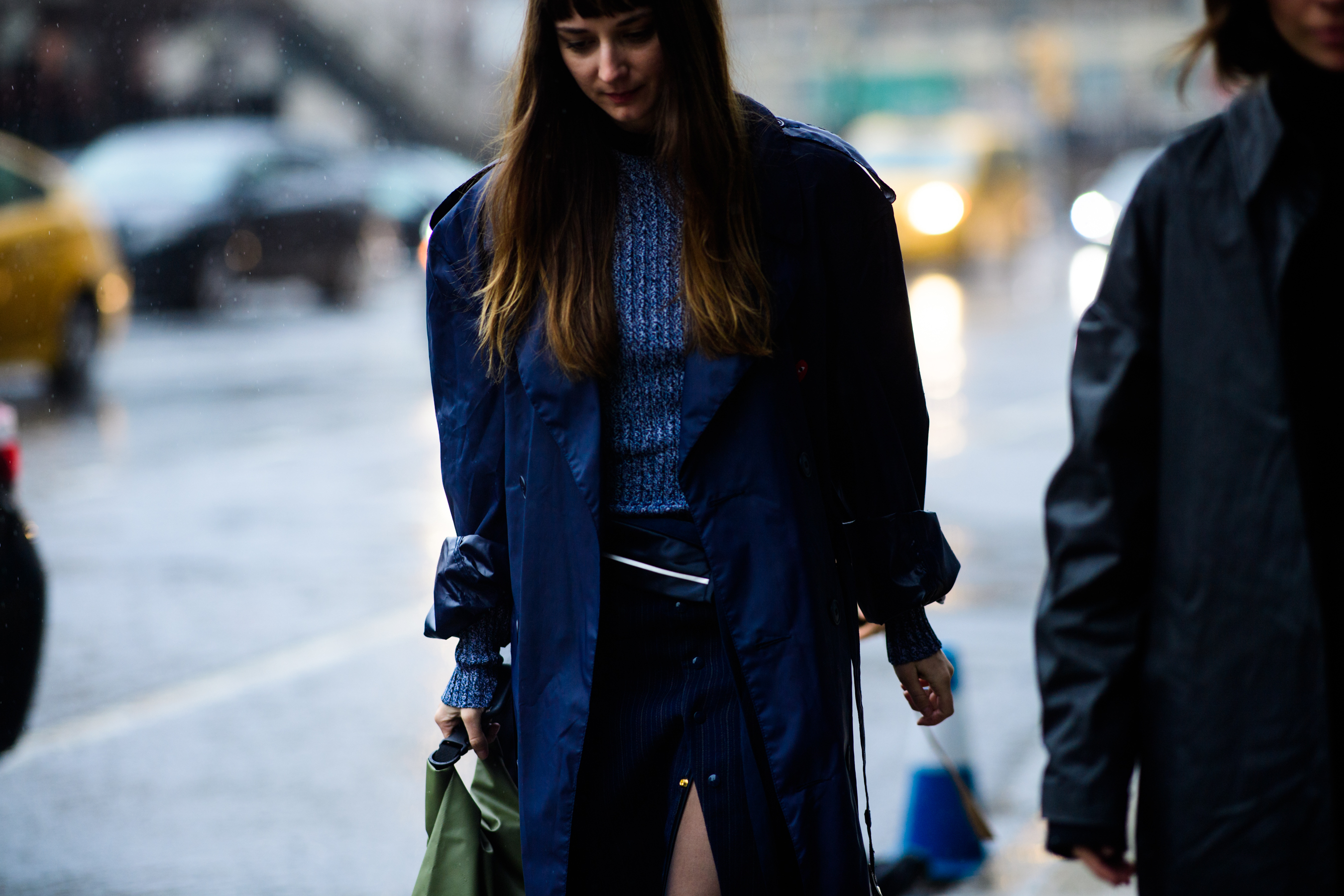 Fashion director wearing blue coat