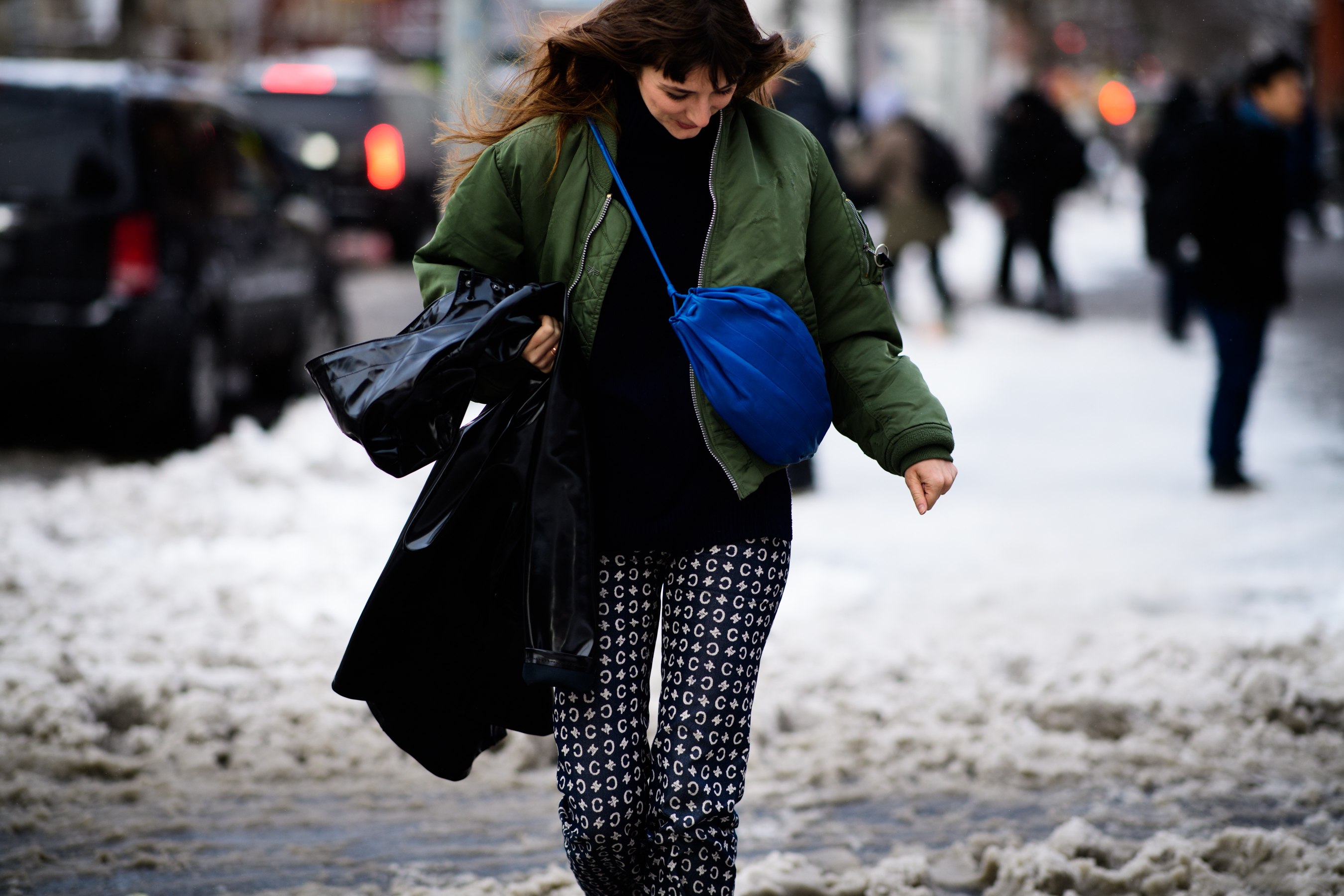 Woman wearing green jacket
