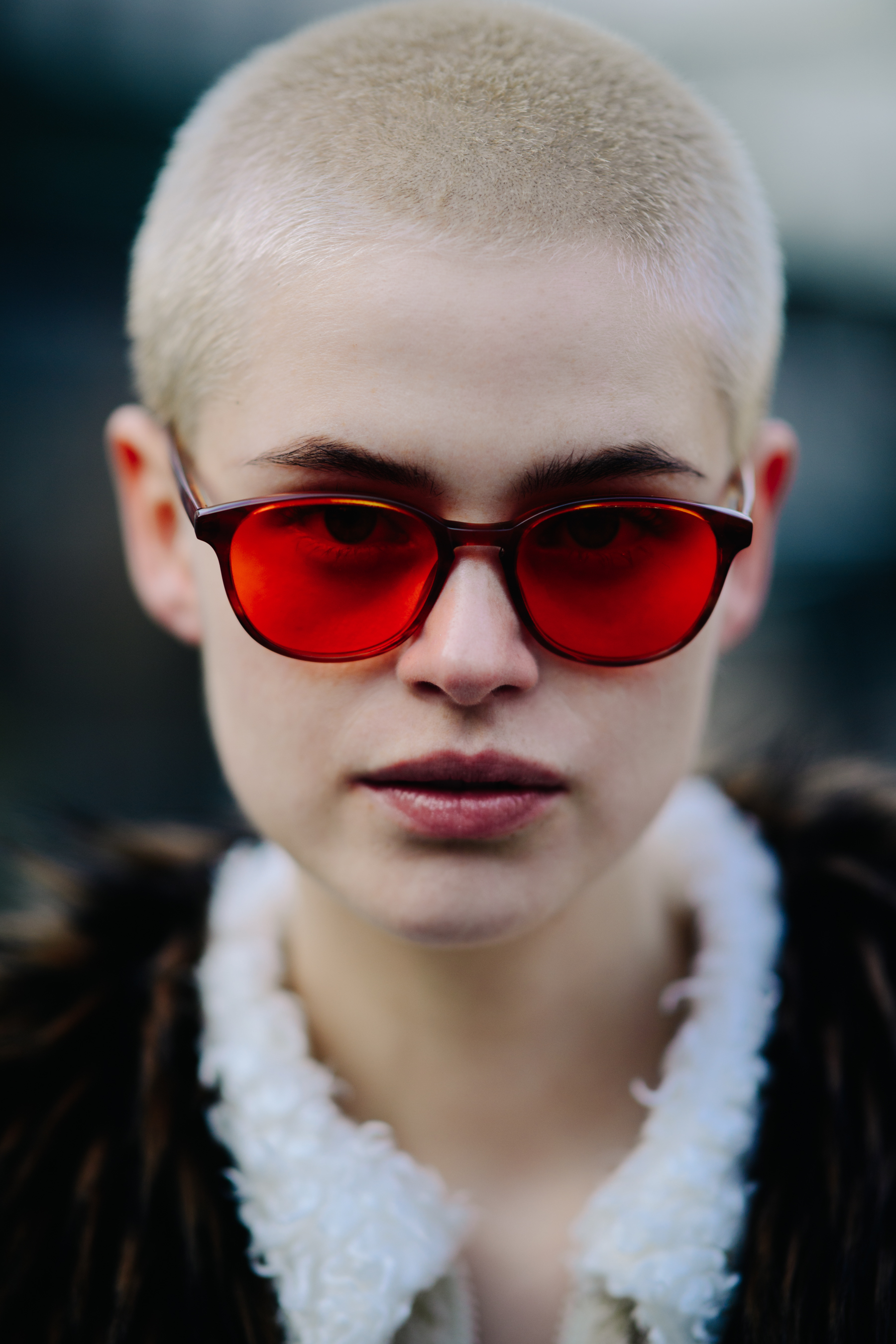 Portrait of woman with red sunglasses
