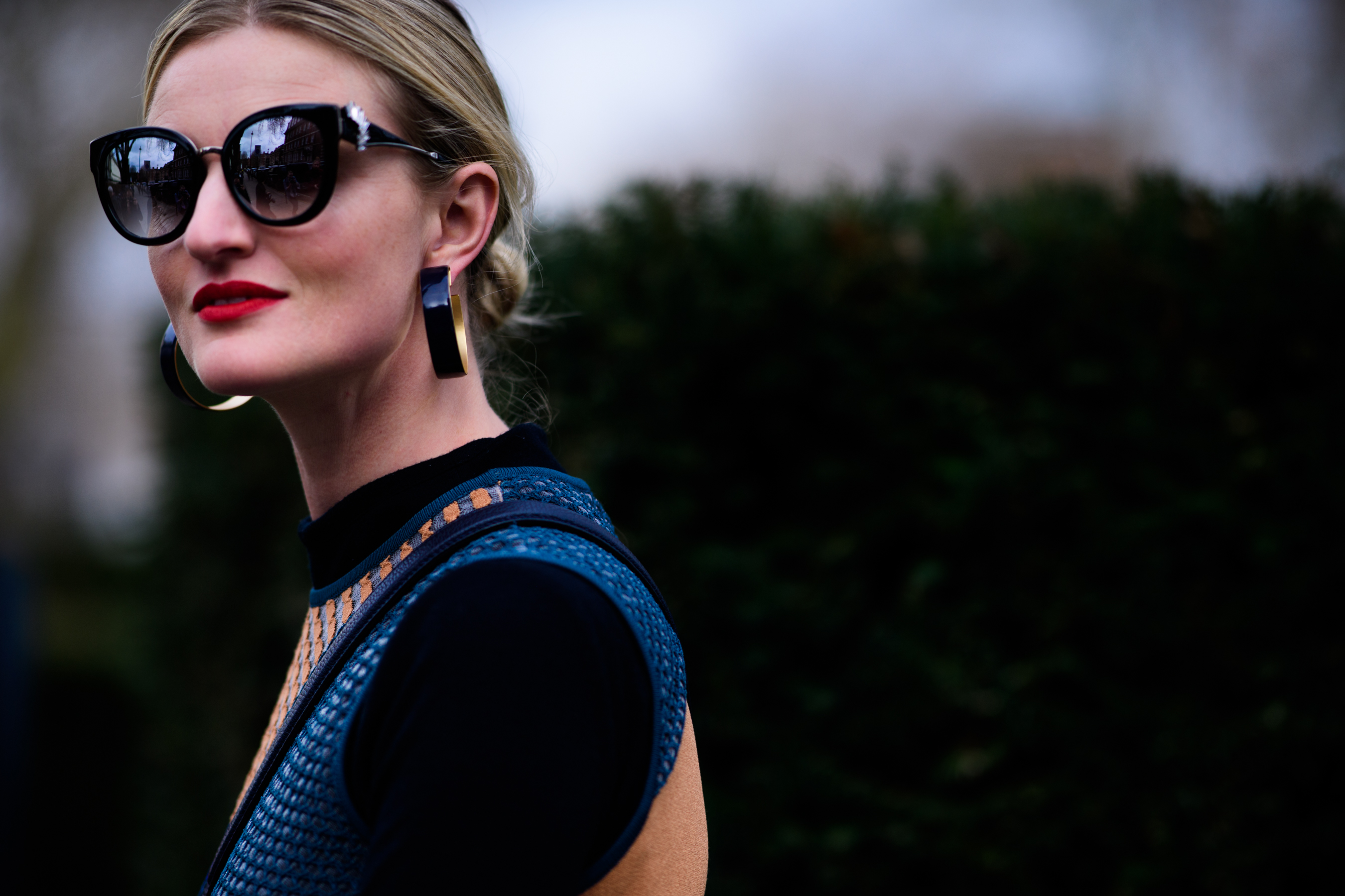Woman wearing cat eye style glasses