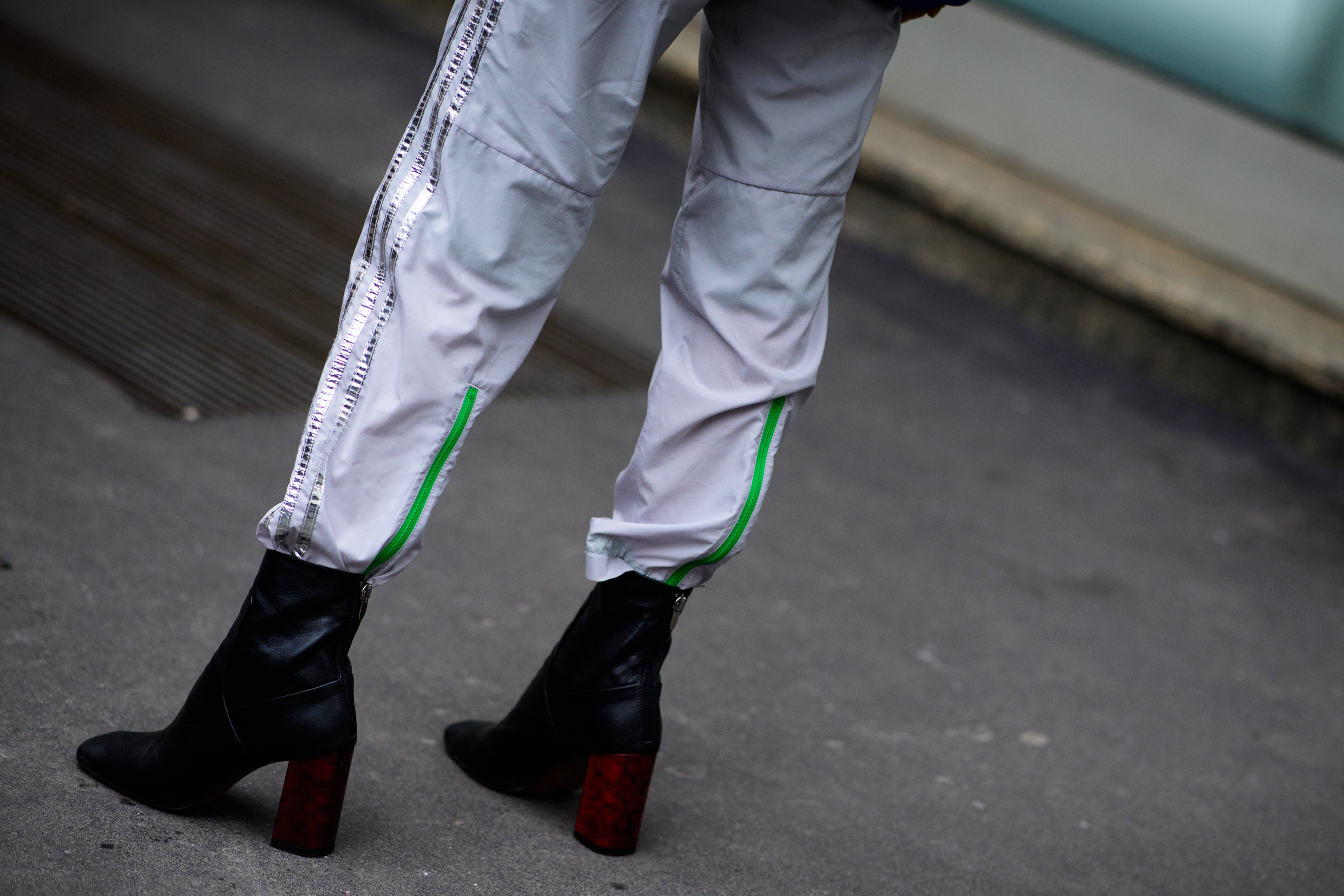 Woman wearing Adidas pants