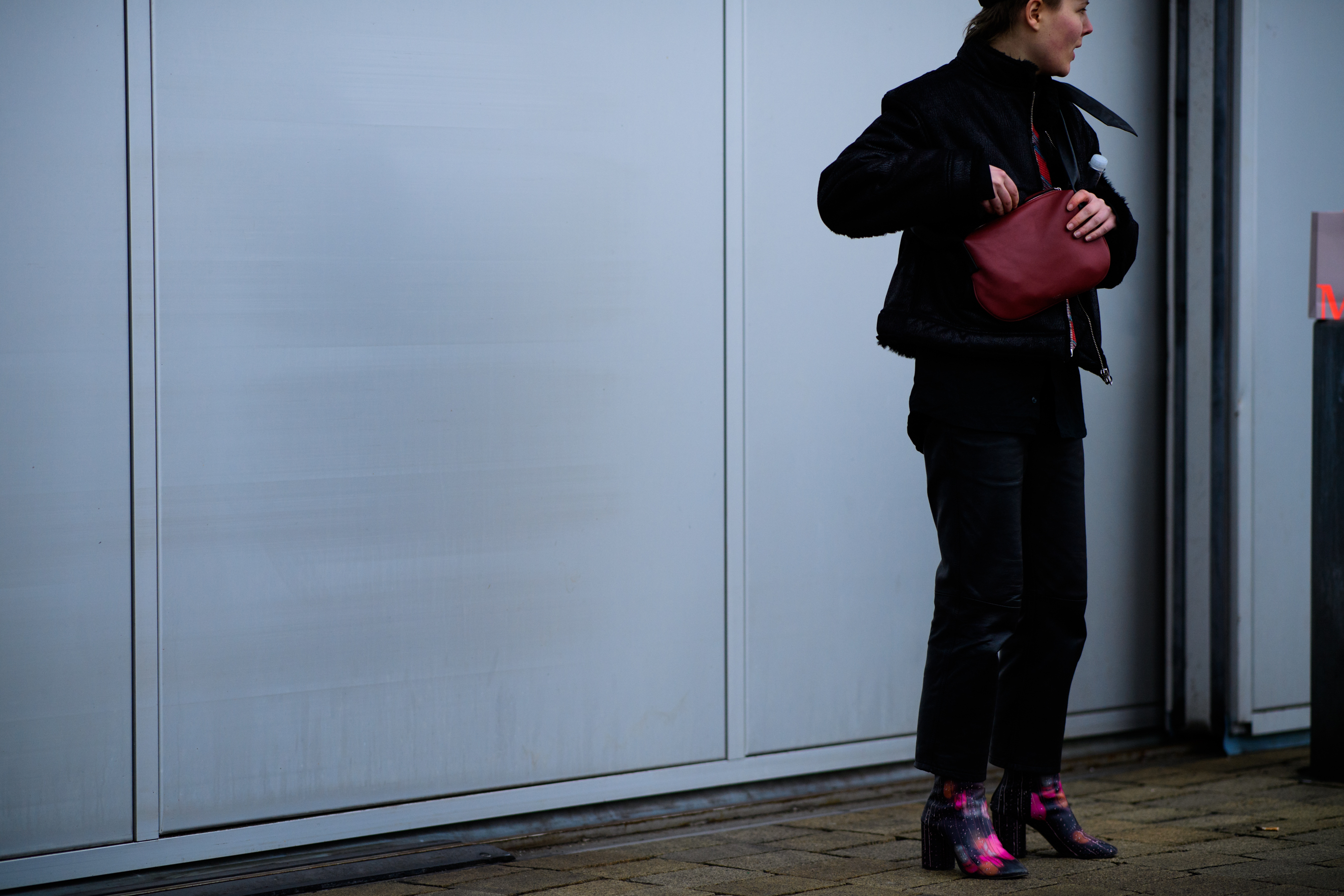 Woman with red handbag
