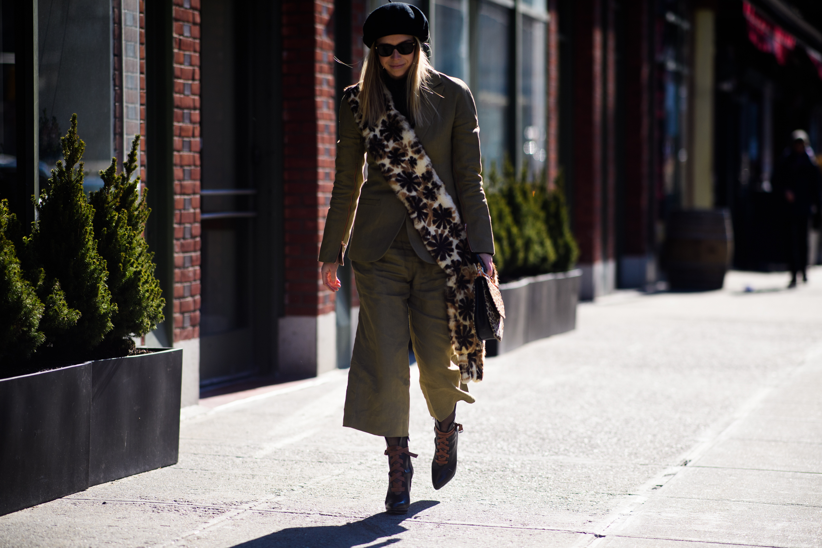 Woman wearing navy color clothes Tibi